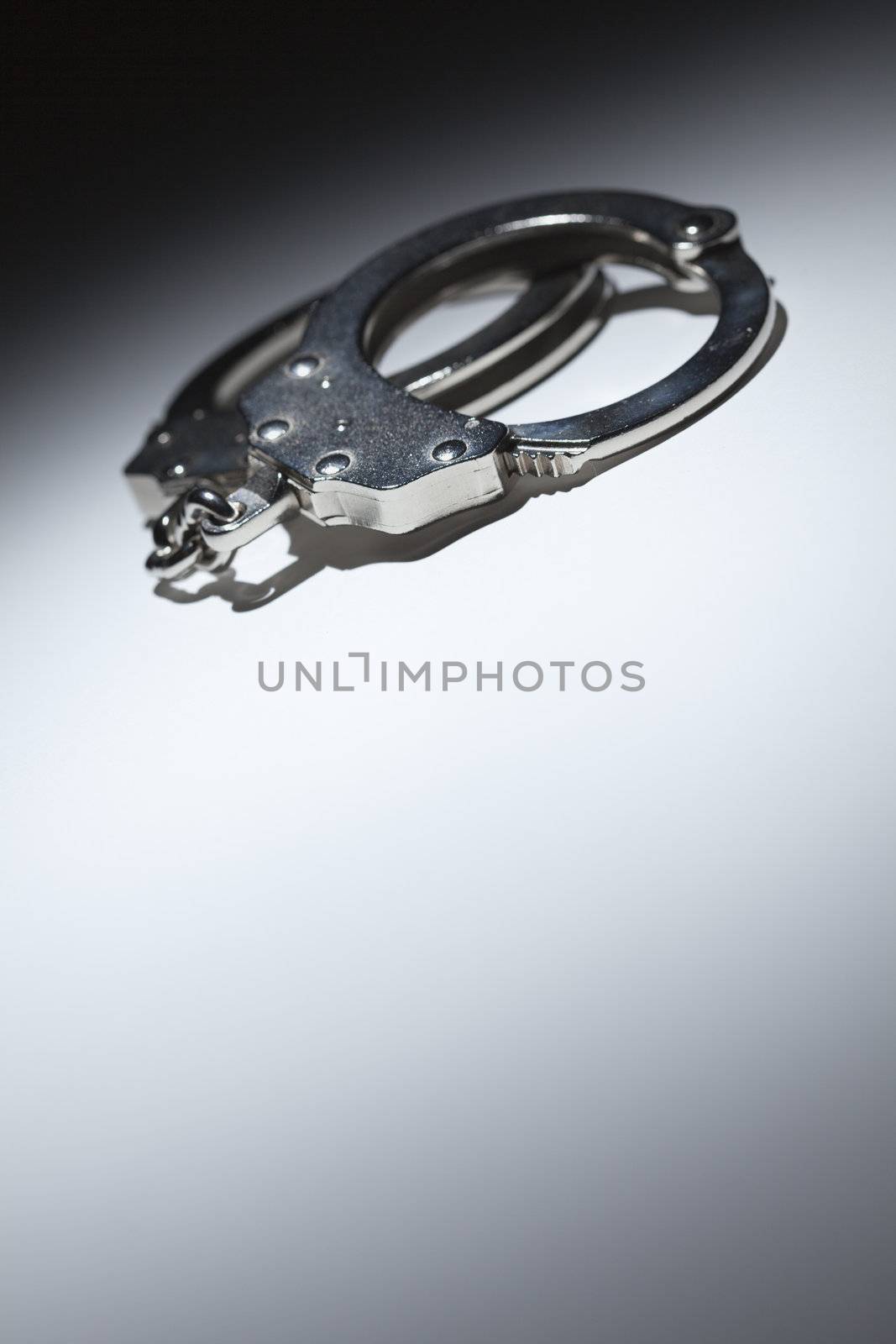 Abstract Pair of Handcuffs Under Spot Light - Text Room by Feverpitched