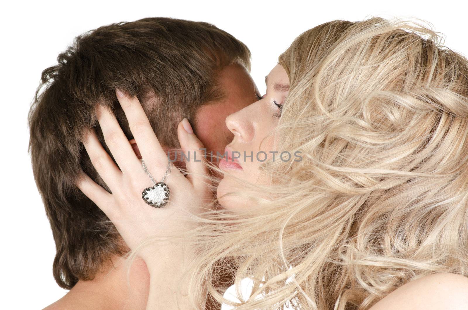 Kissing man and woman - lovers closeup portraits