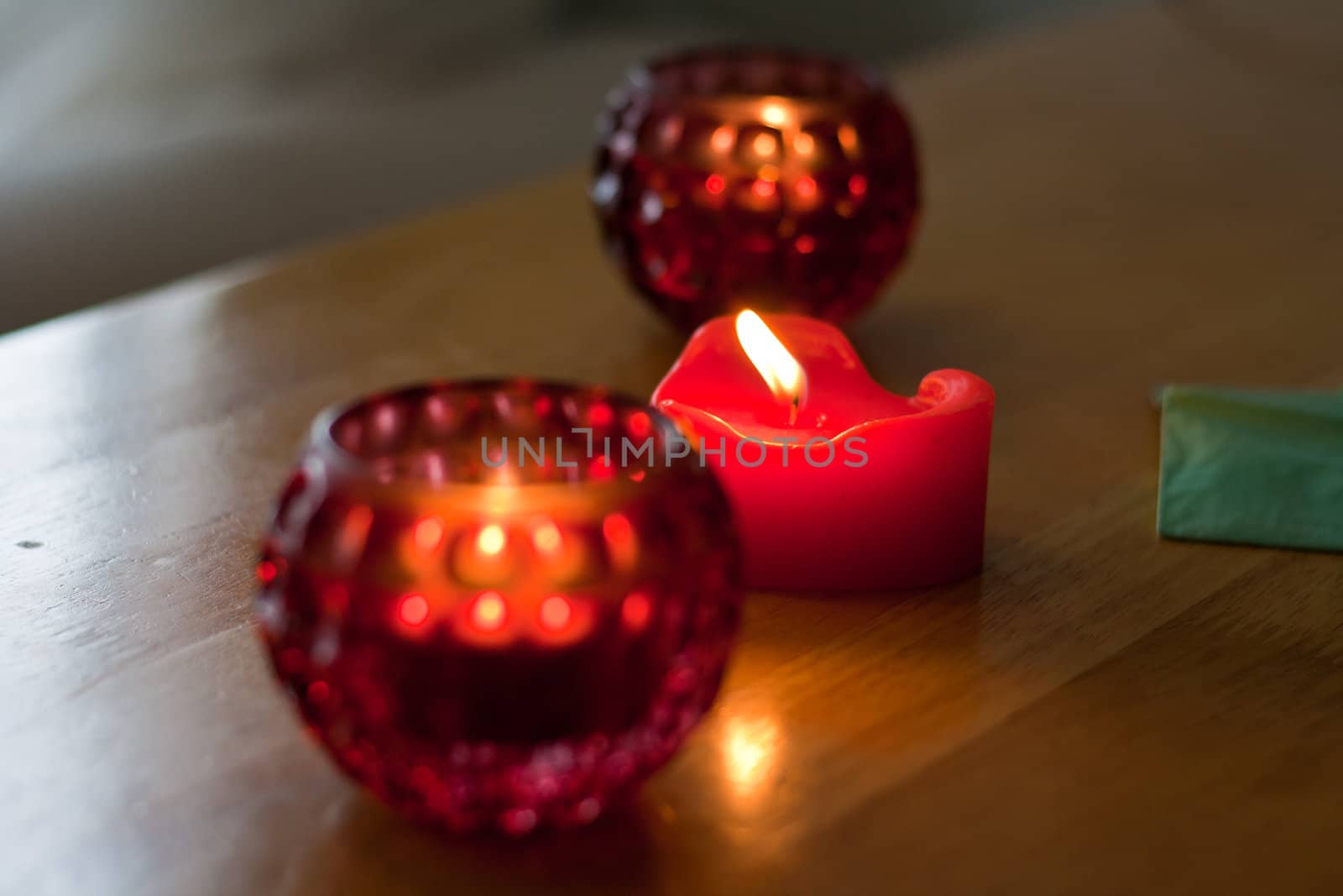 Closeup shallow dof shot of a three red candles.