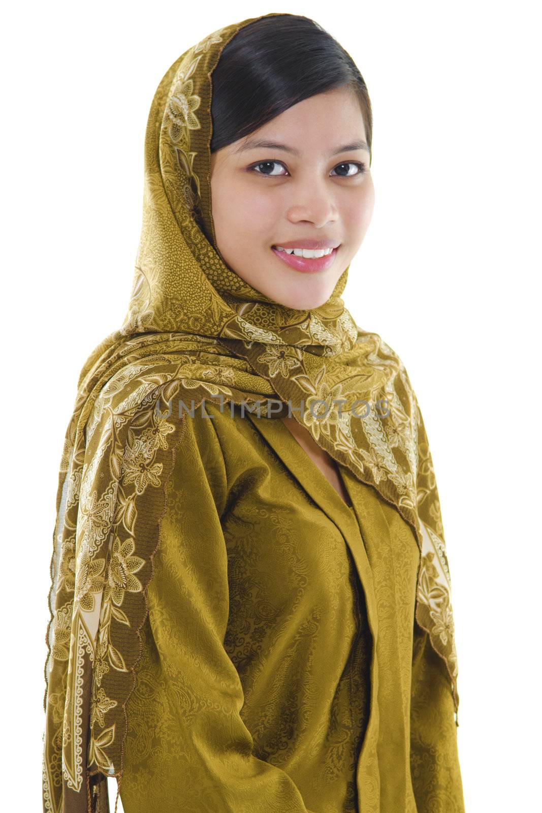 Portrait of a young muslim woman on white background