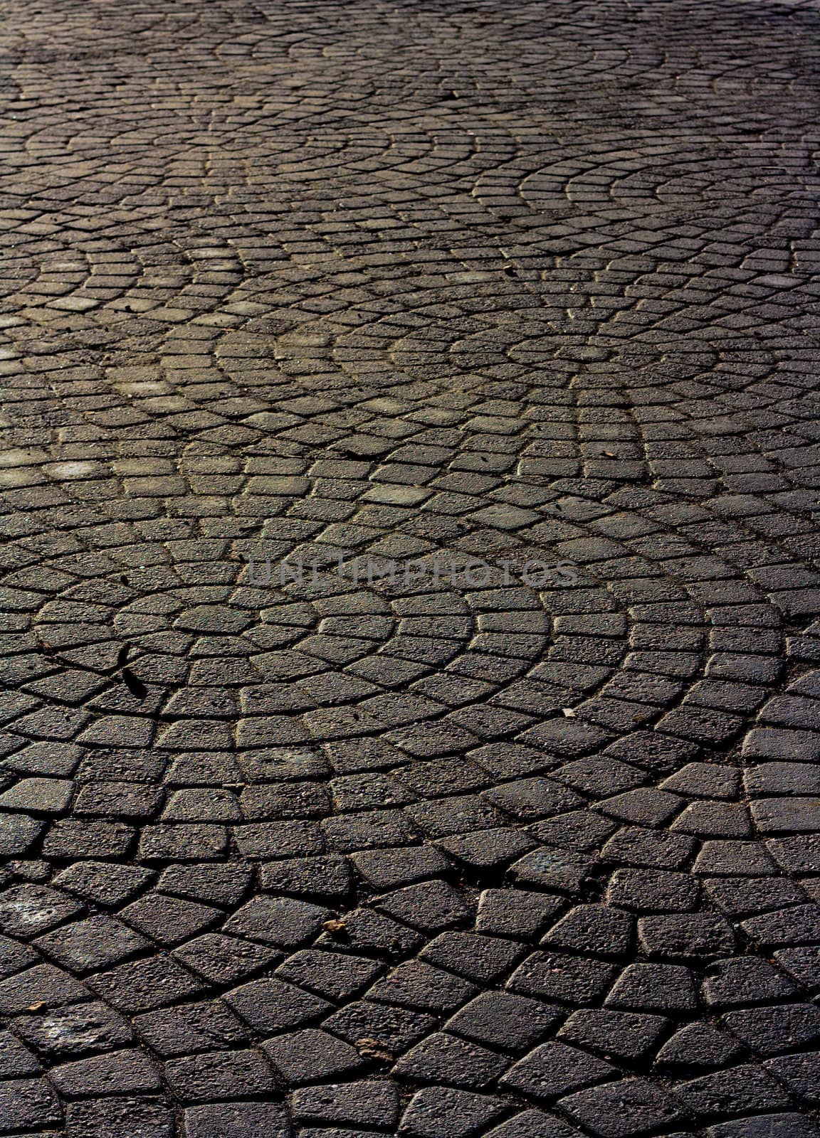 Round pavement rocks going to infinite.