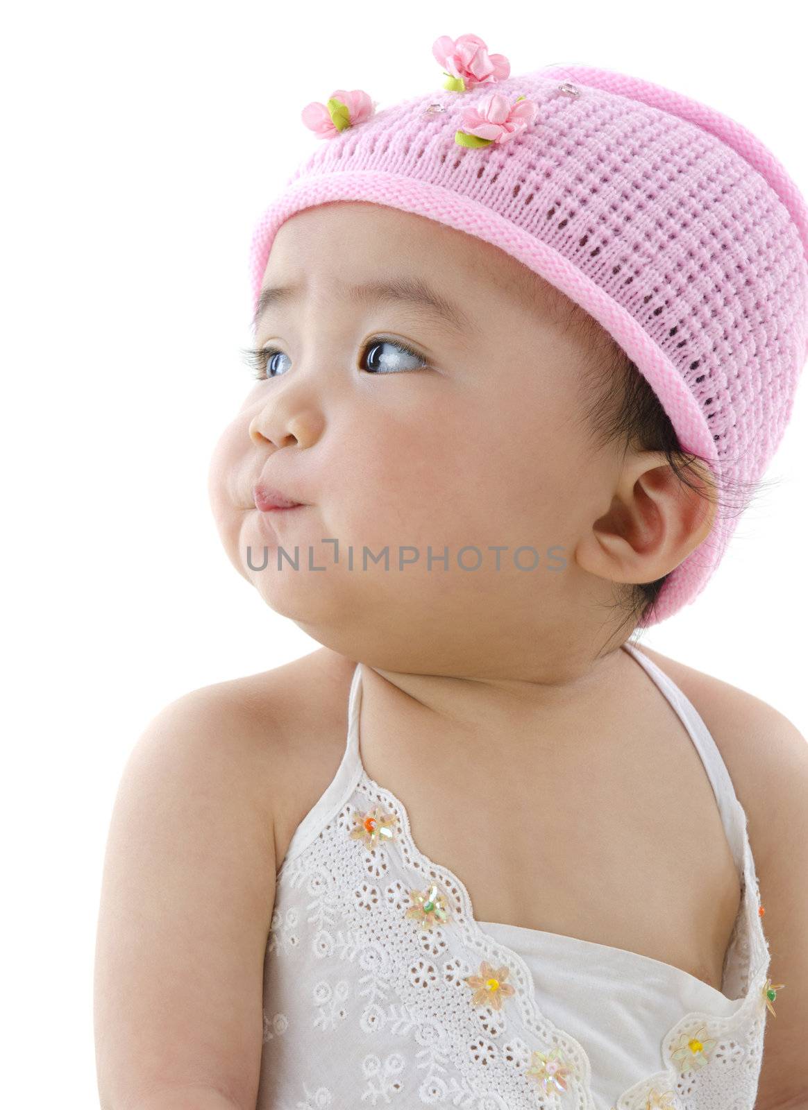 Beautiful 10 month old pan asian baby girl in pink flower hat