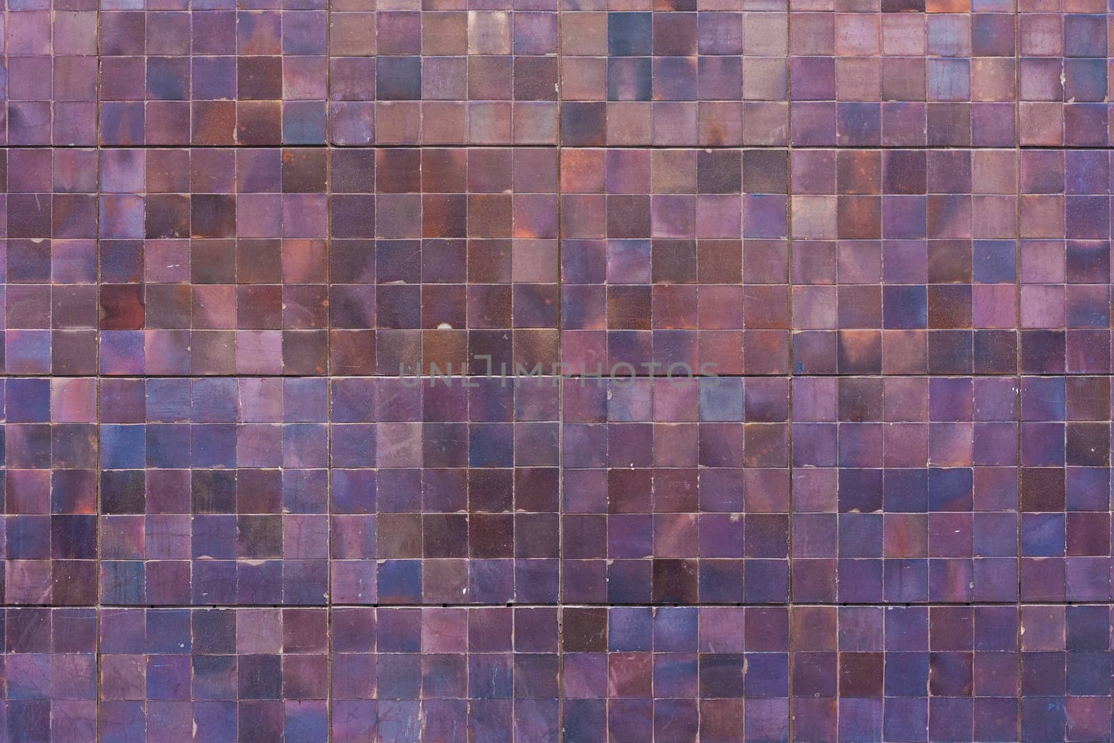 Mosaic background photo of a building wall.