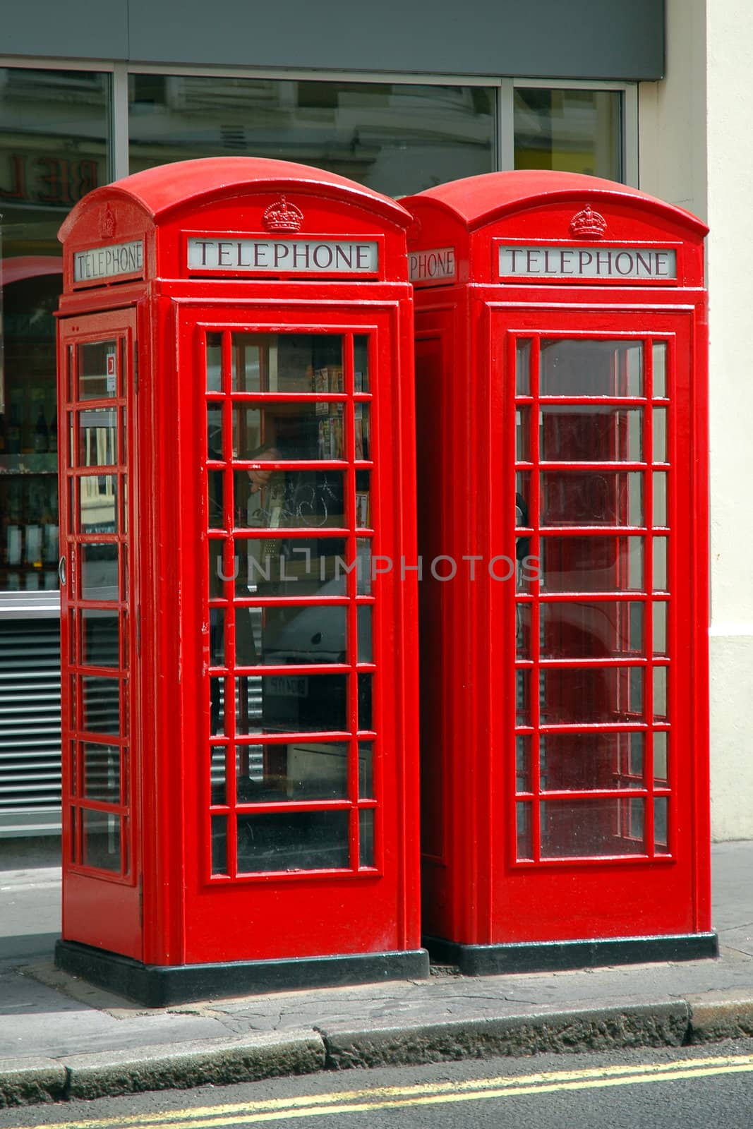 Typical british public payphone, in London, United Kingdom