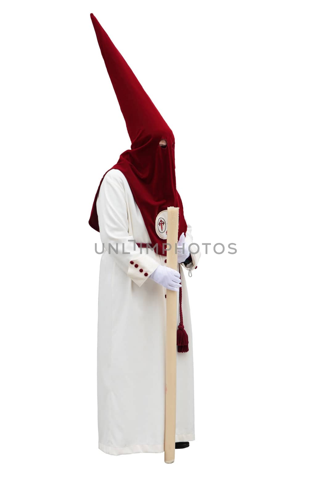 brotherhood nazareno carrying a clipped candle and isolated