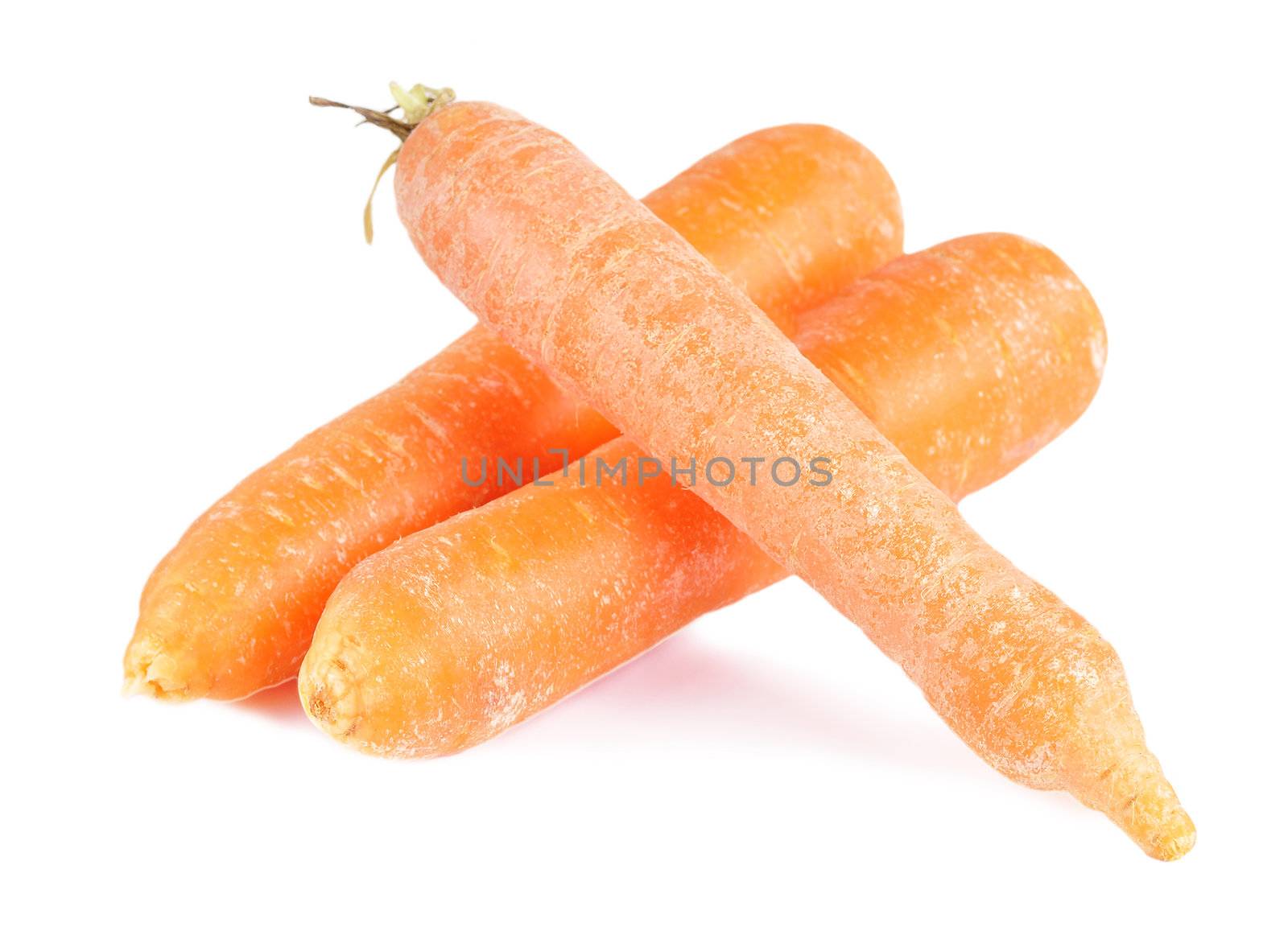Three carrots on a white background