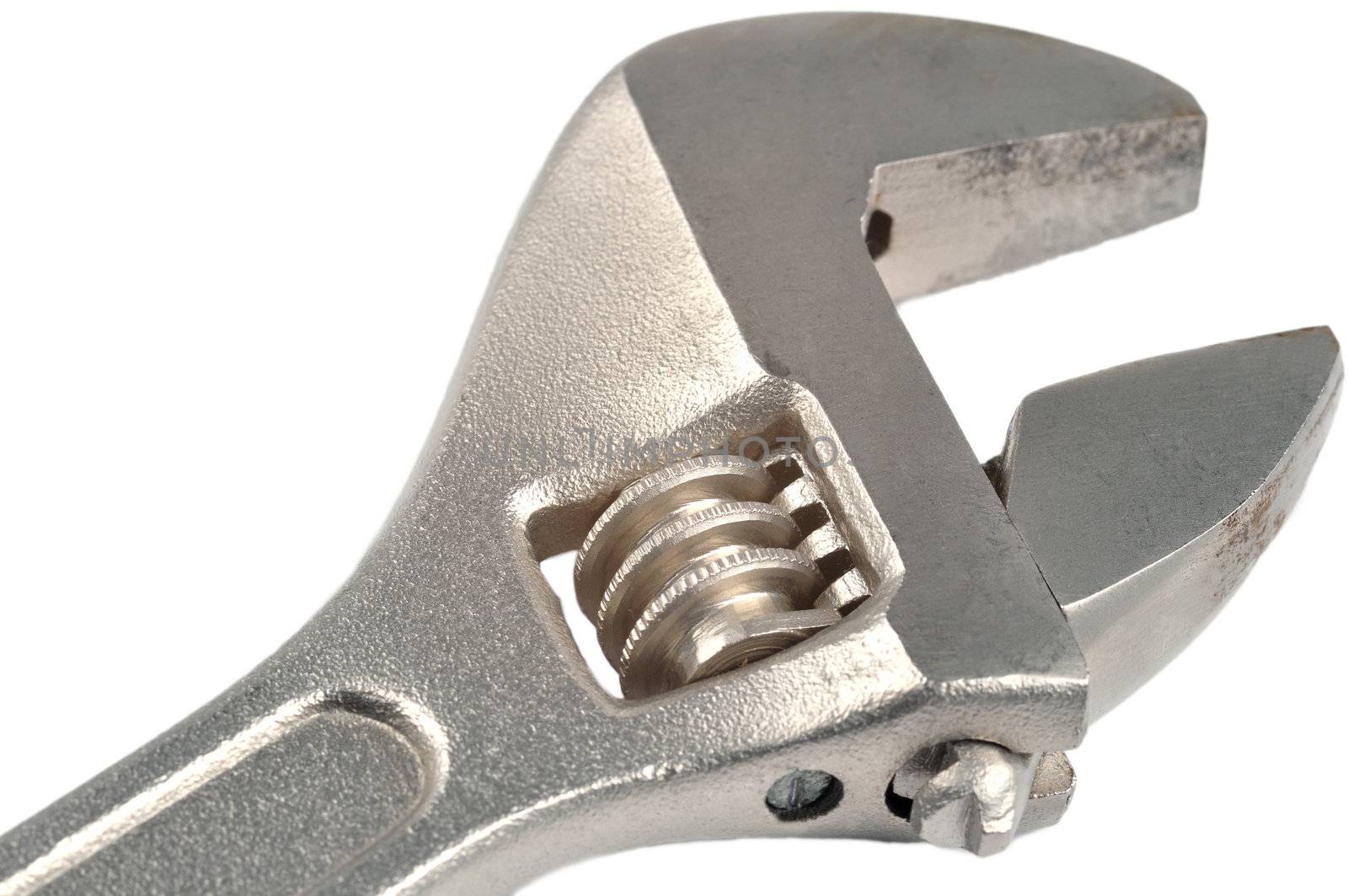 Closeup of a wrench on a white background