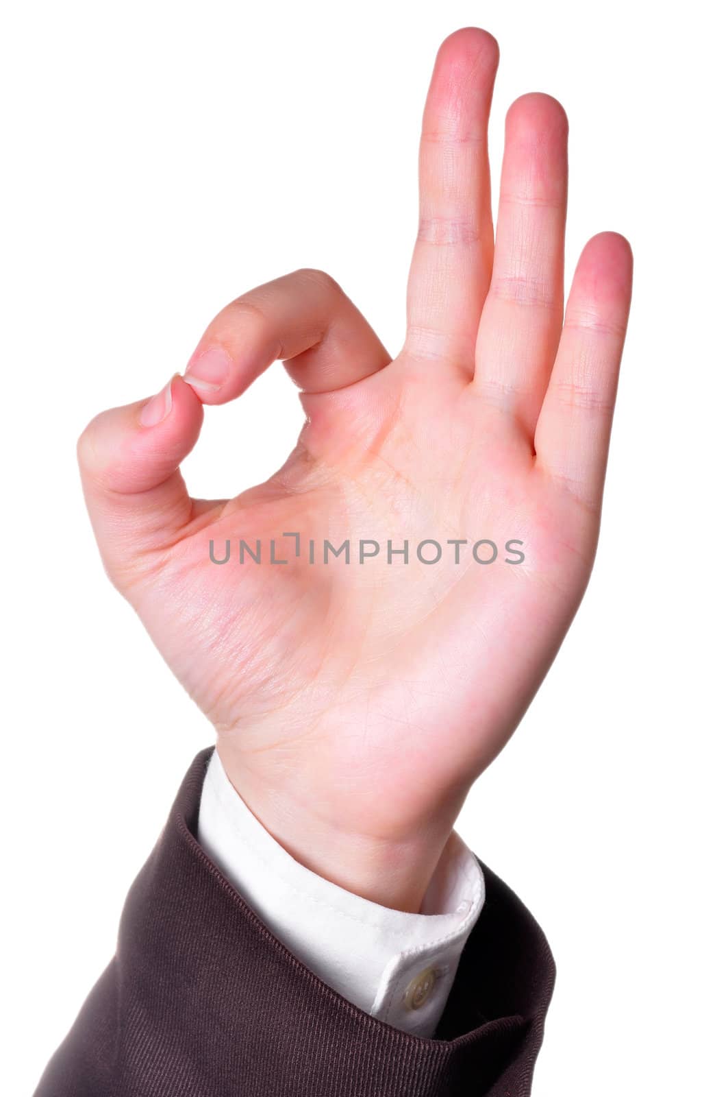 Hand in a suit making the OK sign isolated in white background