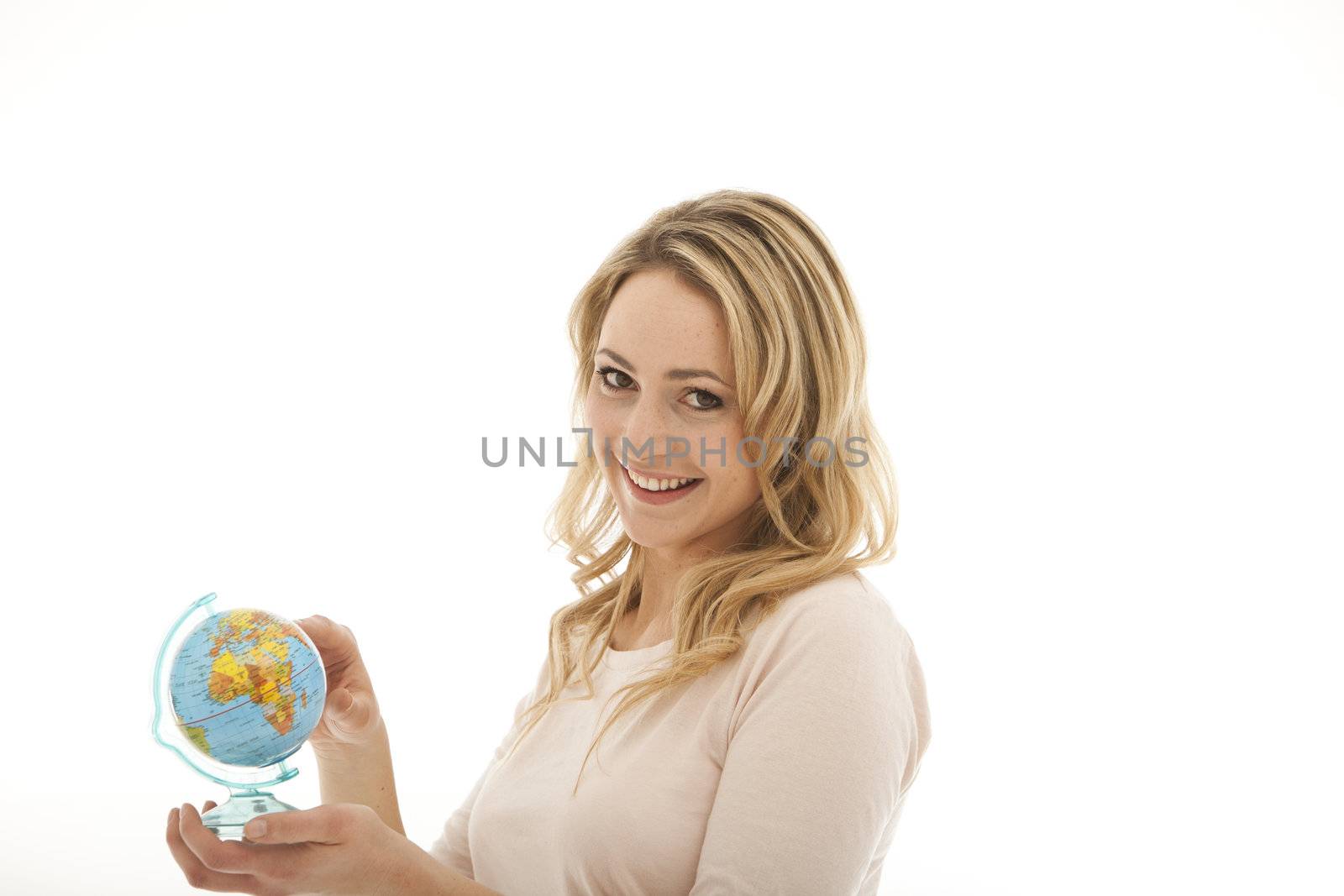 Smiling woman holding globe on white background
