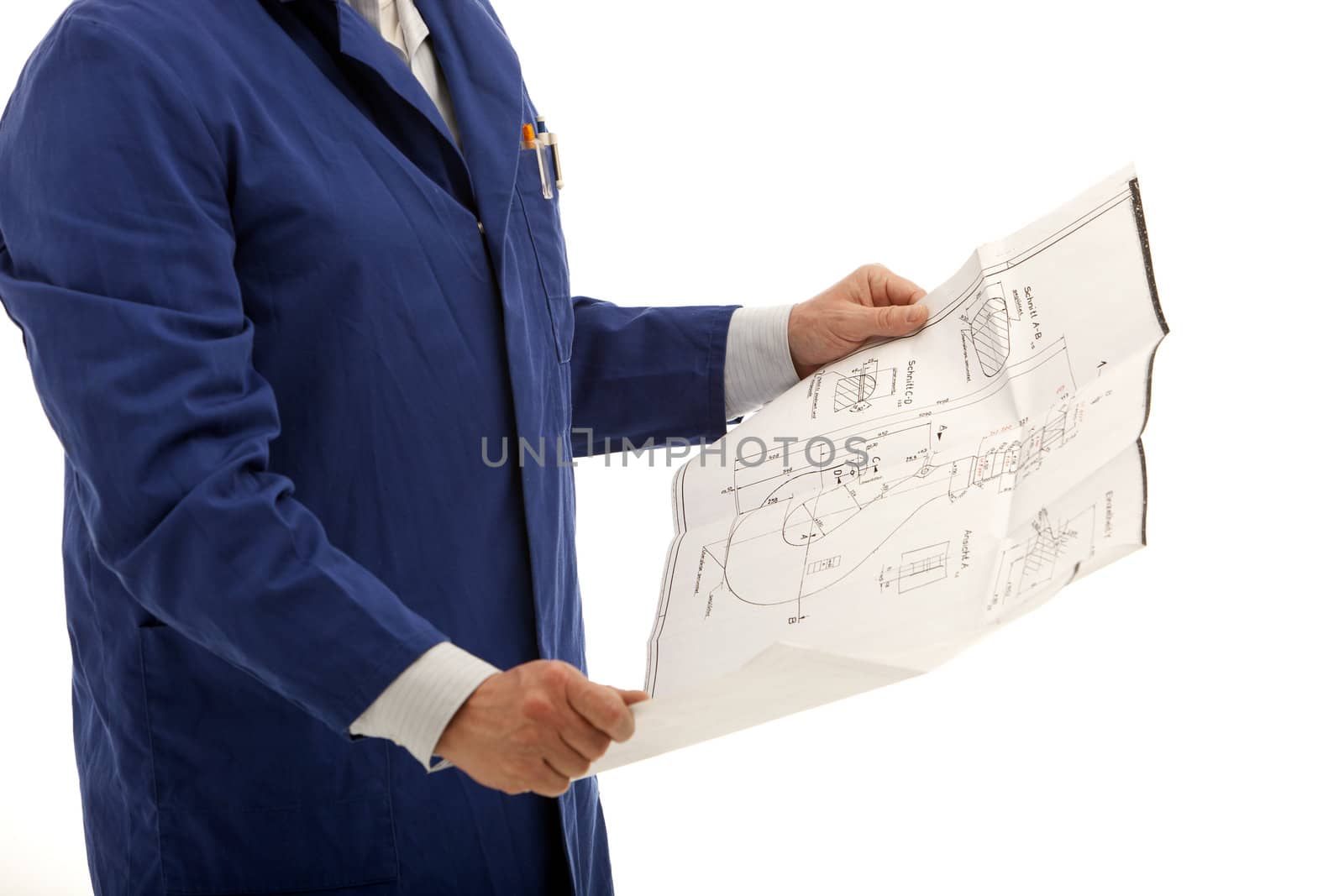 Hands of an engineer or contractor consulting a blueprint drawing isolated on white