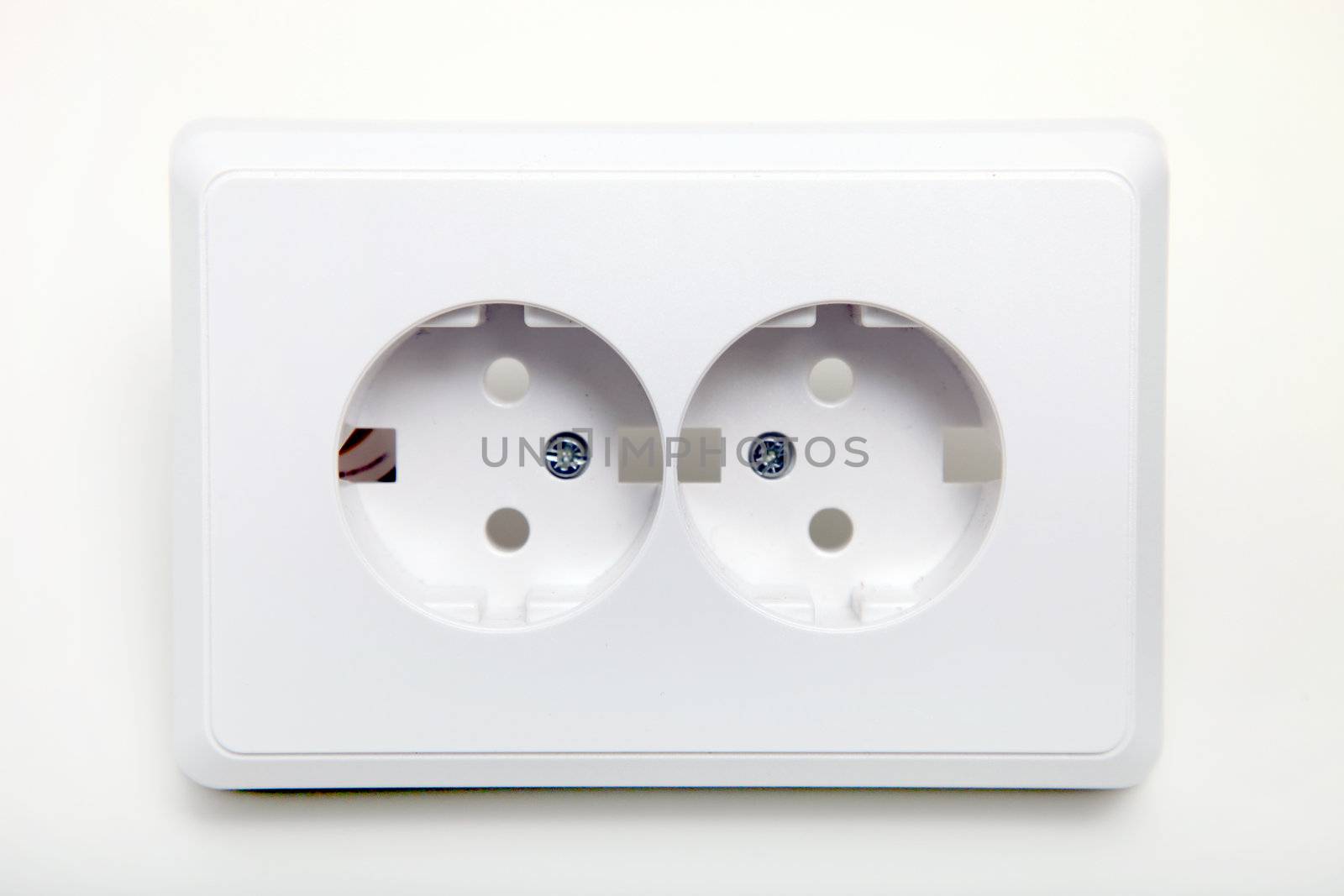 Dual plastic power sockets or outlets to connect a plug for the supply of electricity on a white background