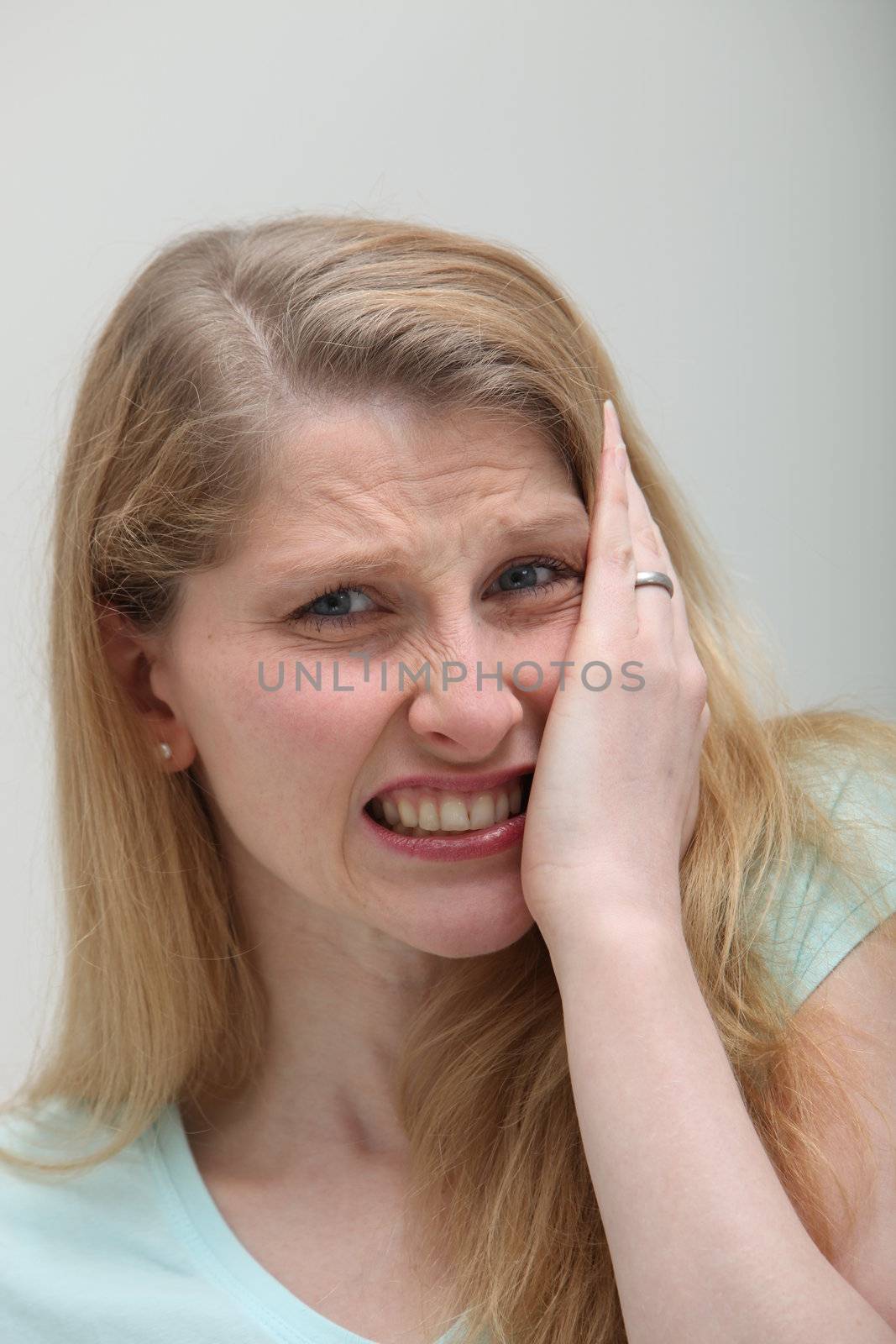 Close up shot of woman with toothache