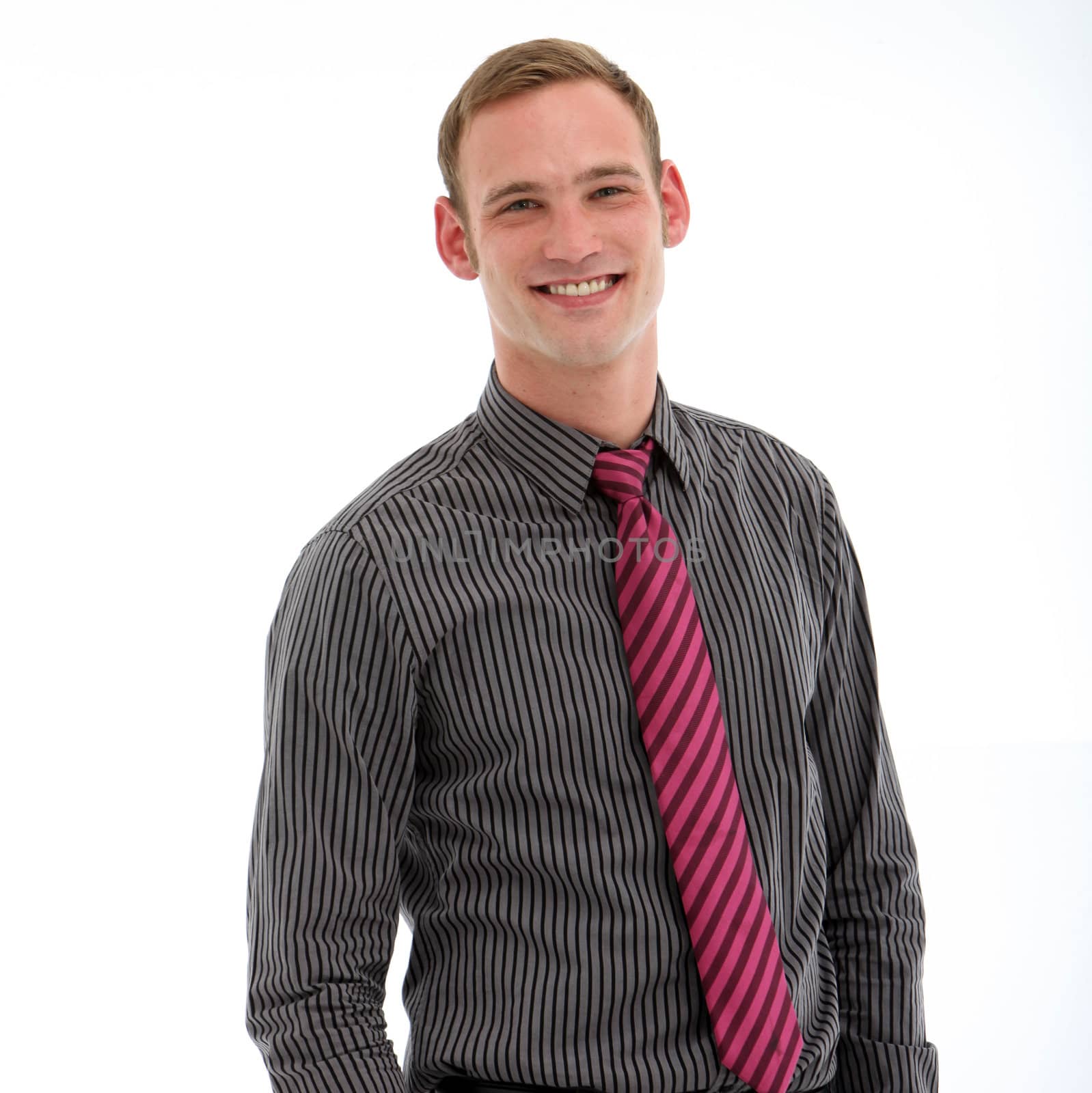 Young smiling man in striped shirt and maroon tie on white background