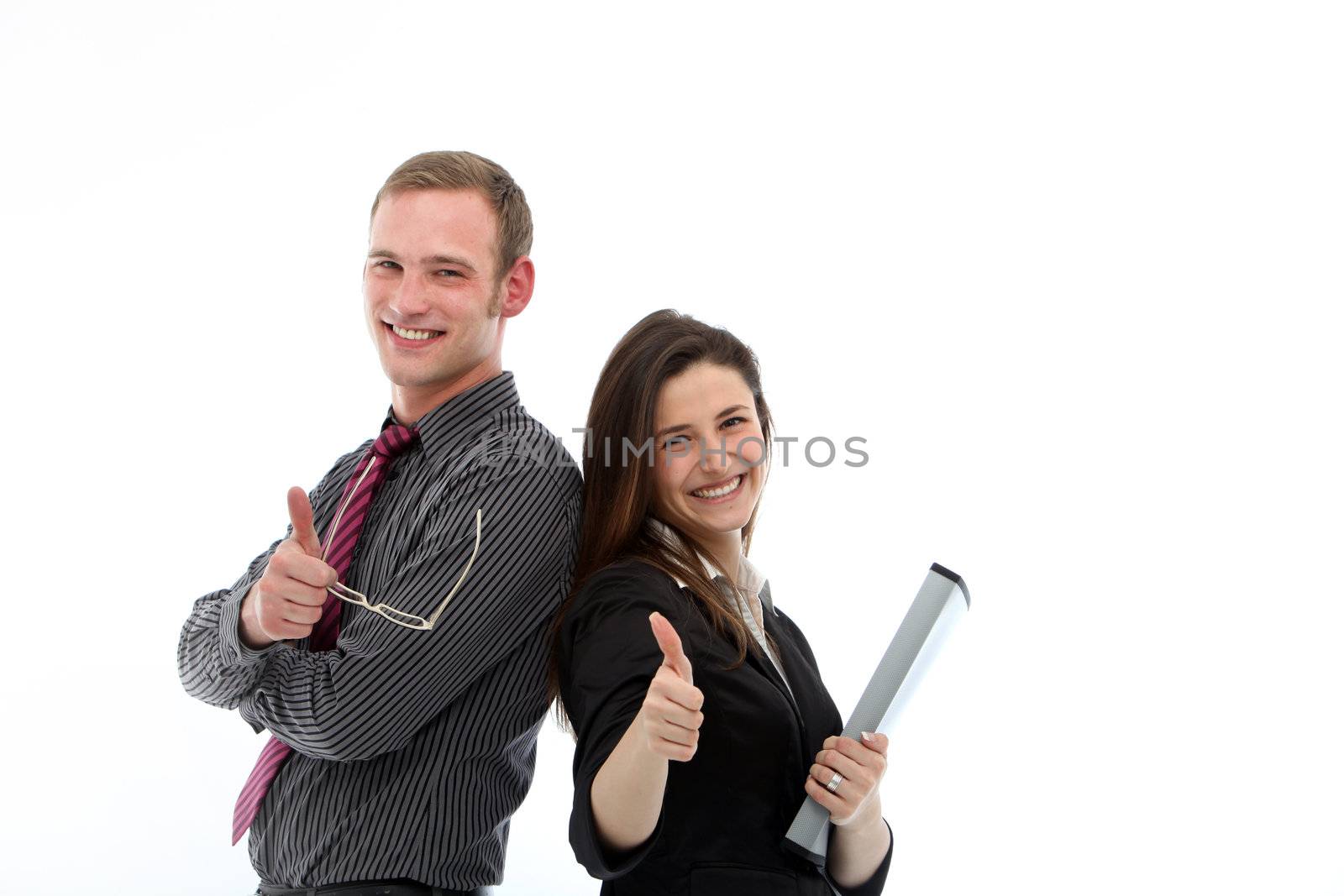 Enthusiastic attractive young business colleagues giving thumbs up for approval and success, man and woman back to back isolated on white