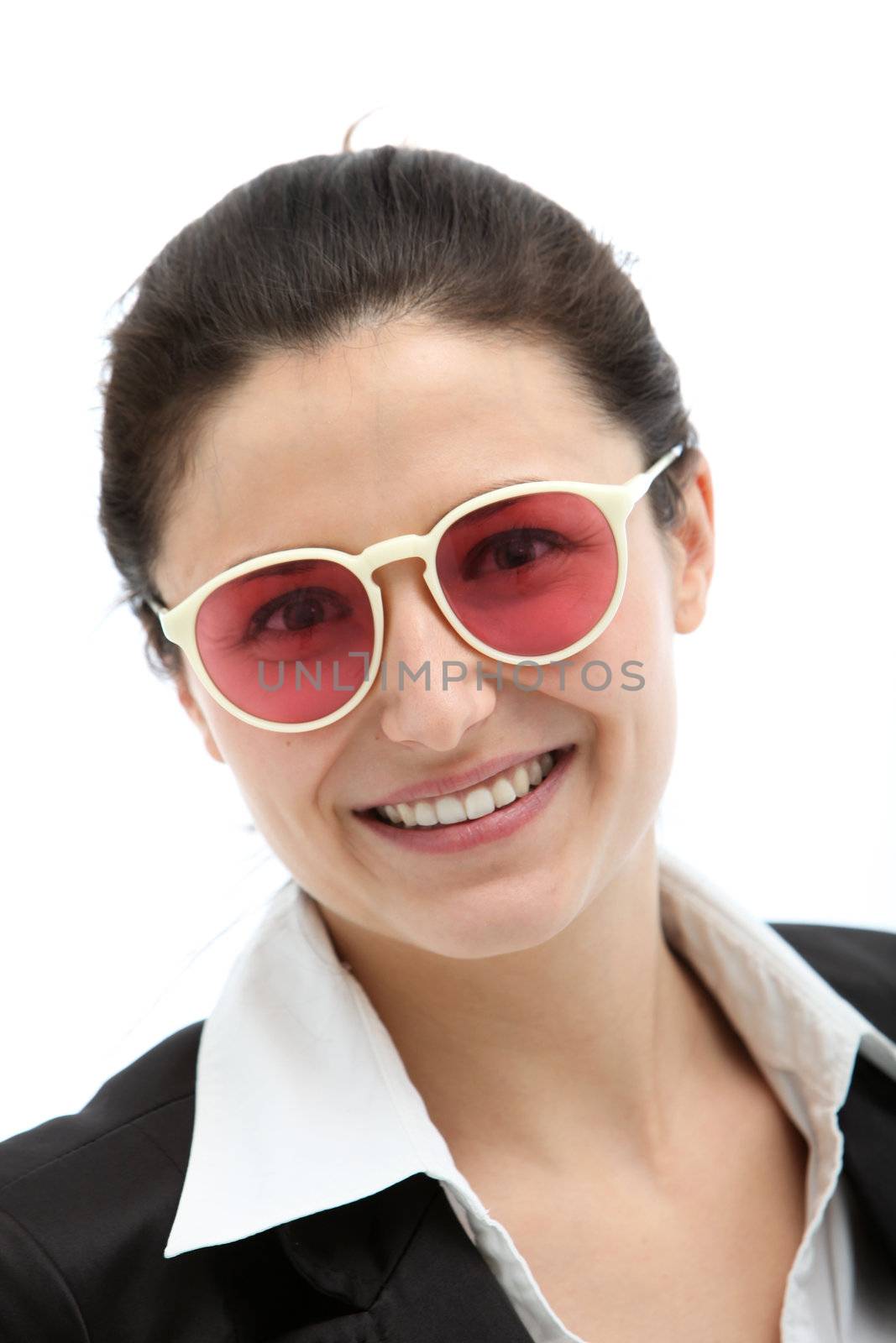 Smiling stylish businesswoman in modern spectacles with coloured lenses isolated on white