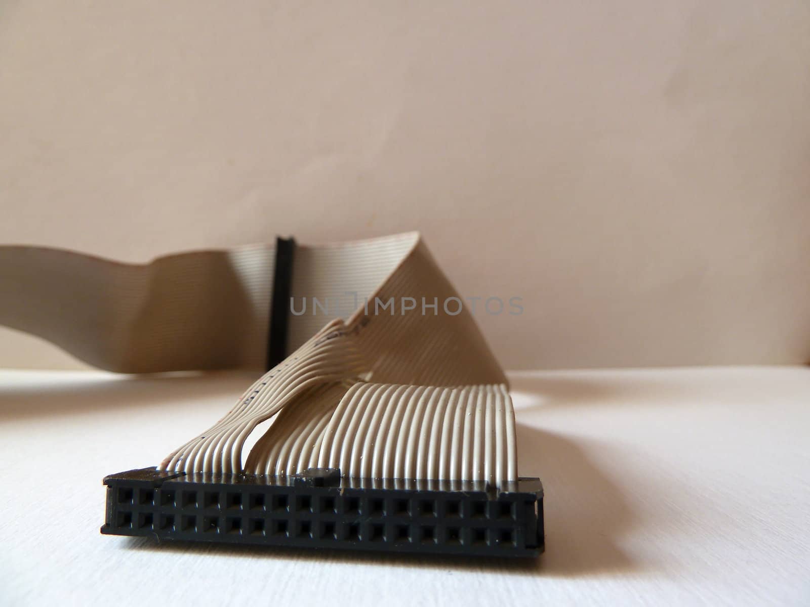 ribbon cable with connector on white background