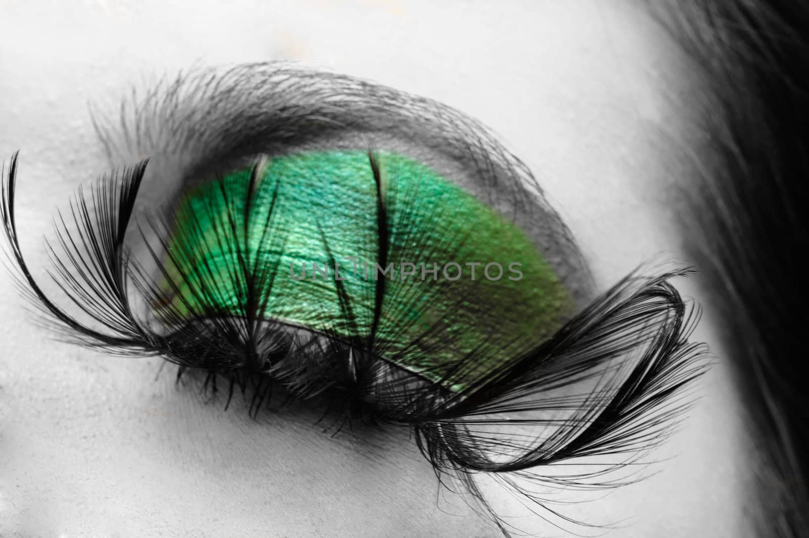 Artistic closeup photo of a young woman in studio