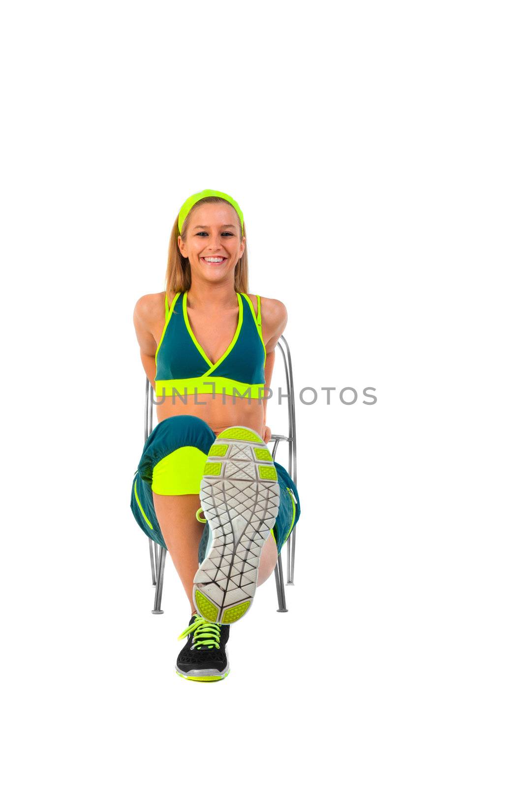 Young fitness instructor sitting on chair