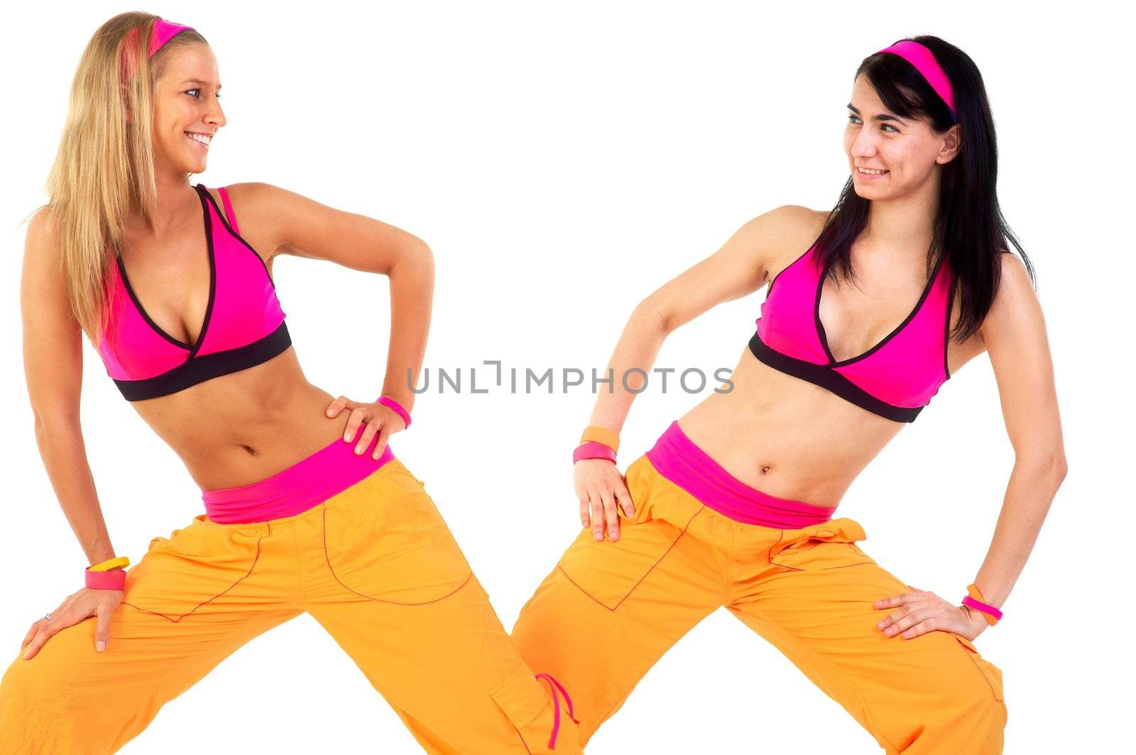 Young fitness instructors against white background by svedoliver