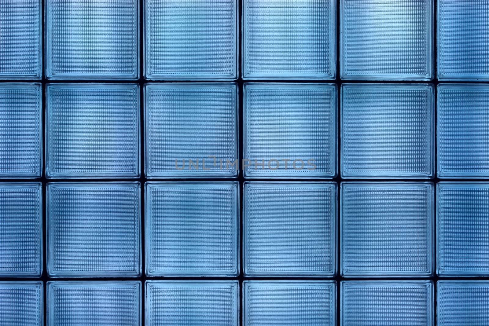 Clean blue transparent textured square glass tile wall construction