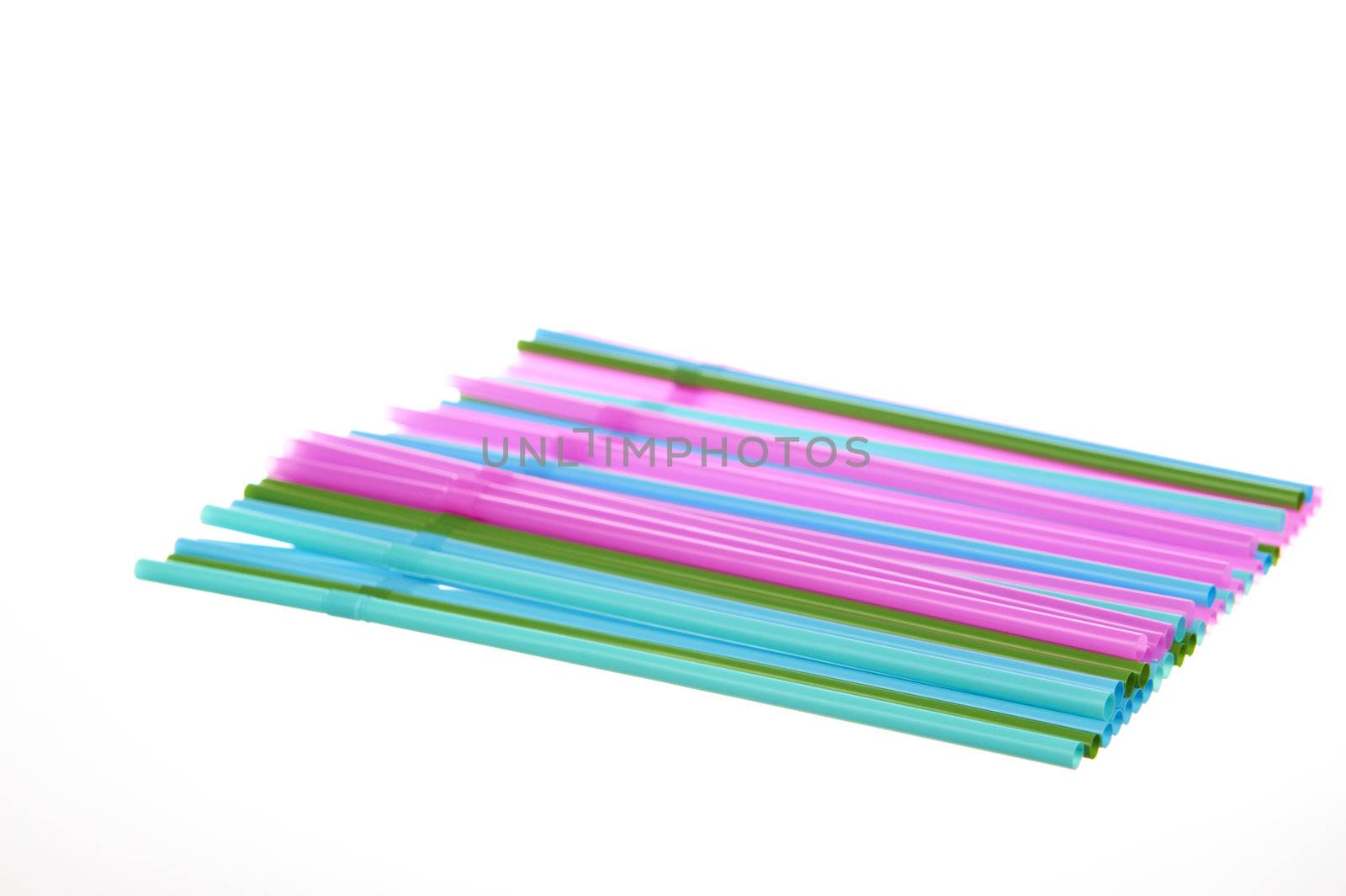 Multible straws isolated on white background by Eydfinnur