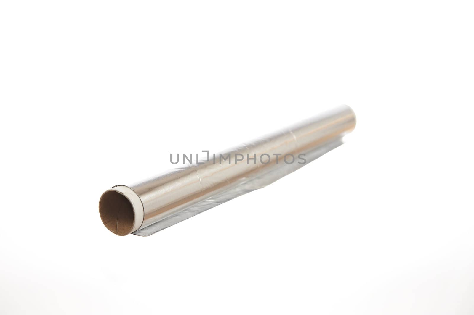 Roll of aluminium foil isolated on white background by Eydfinnur