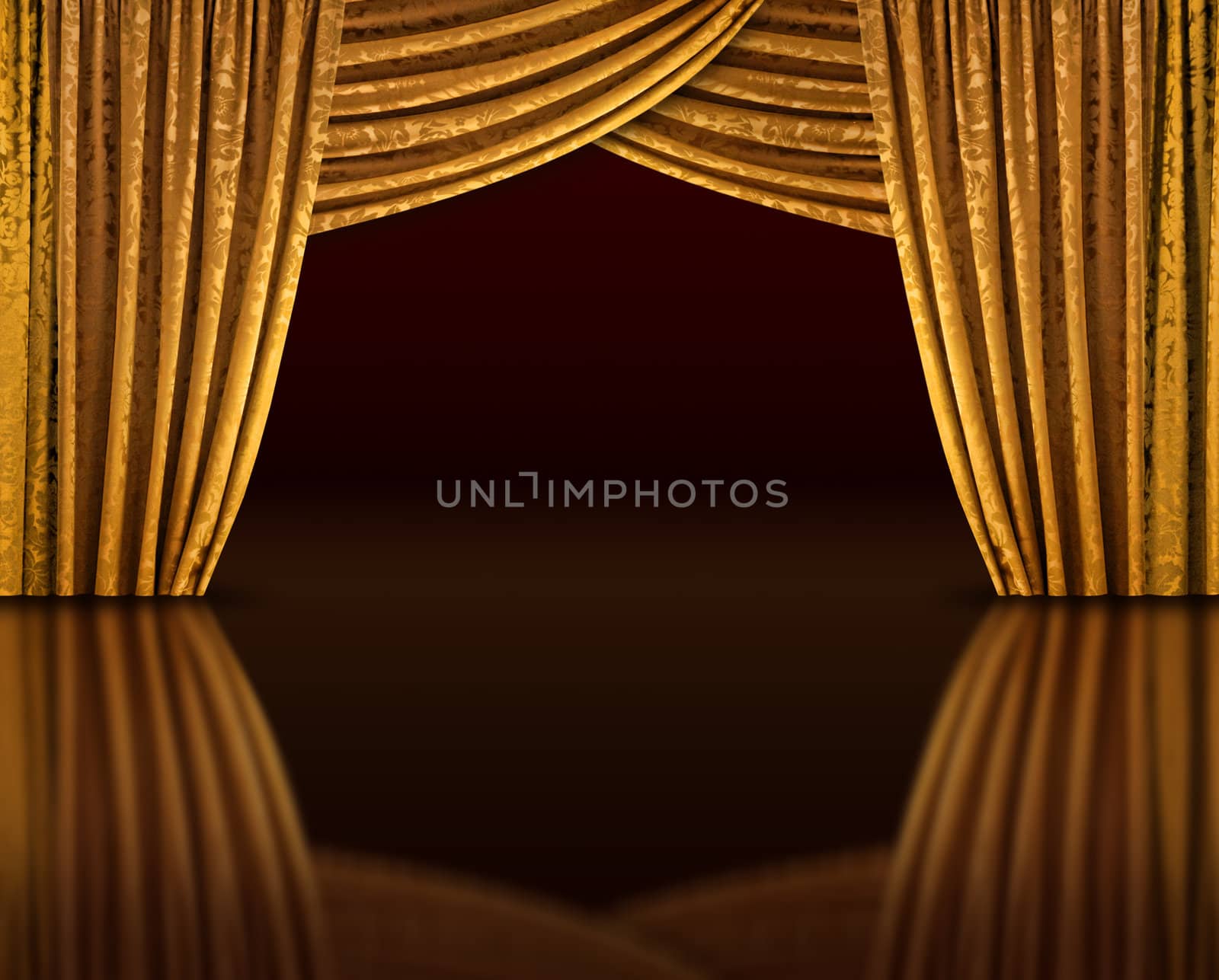 Golden curtains of open stage reflecting from dark floor