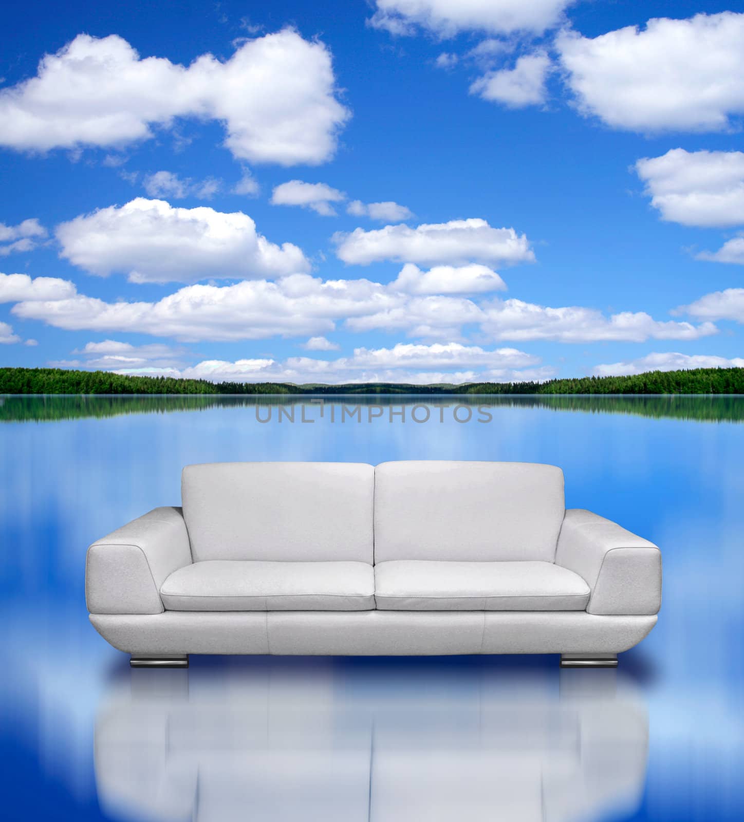 Modern white leather sofa over reflective calm blue lake water