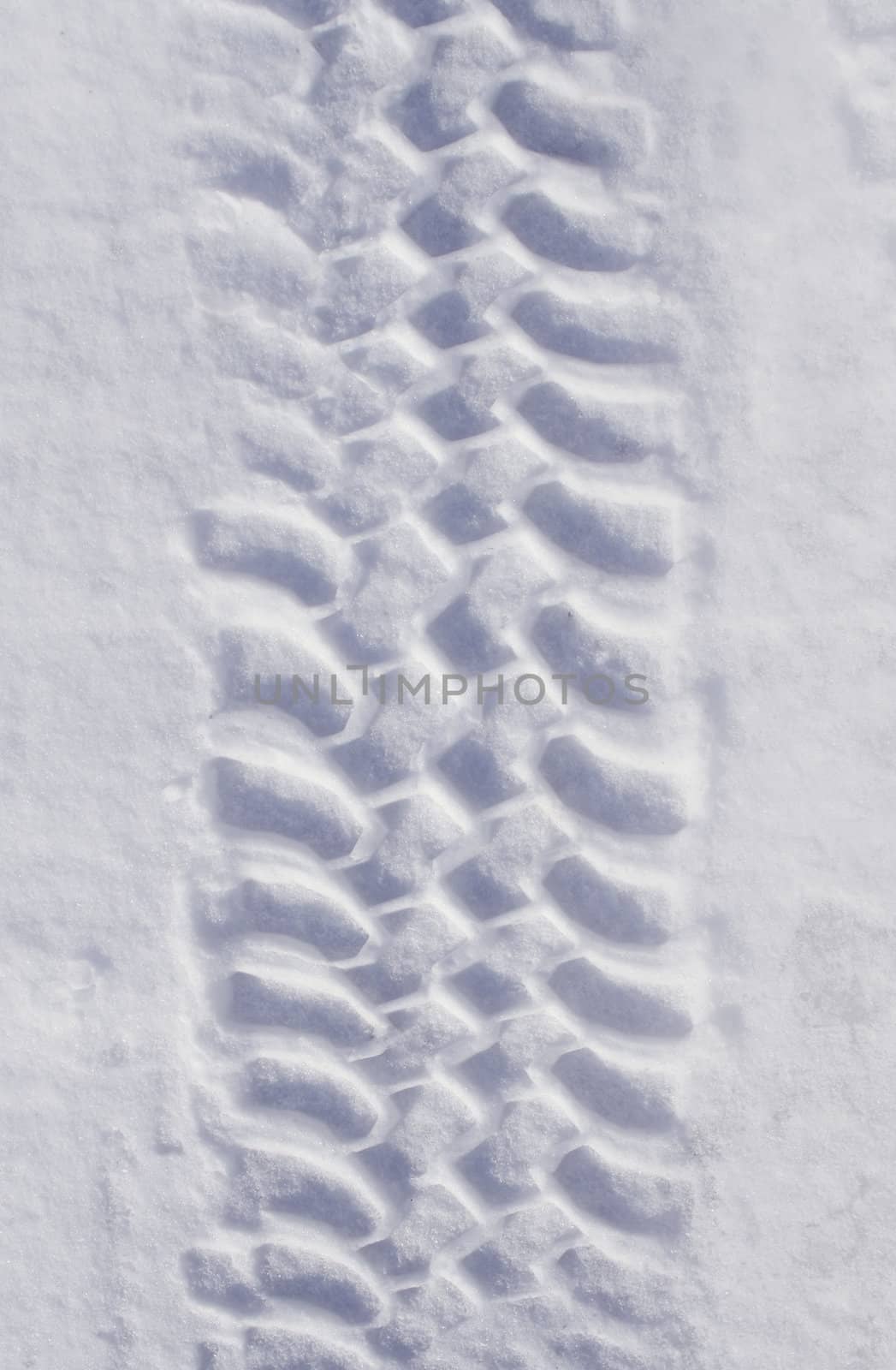 Tire track in snow by anterovium