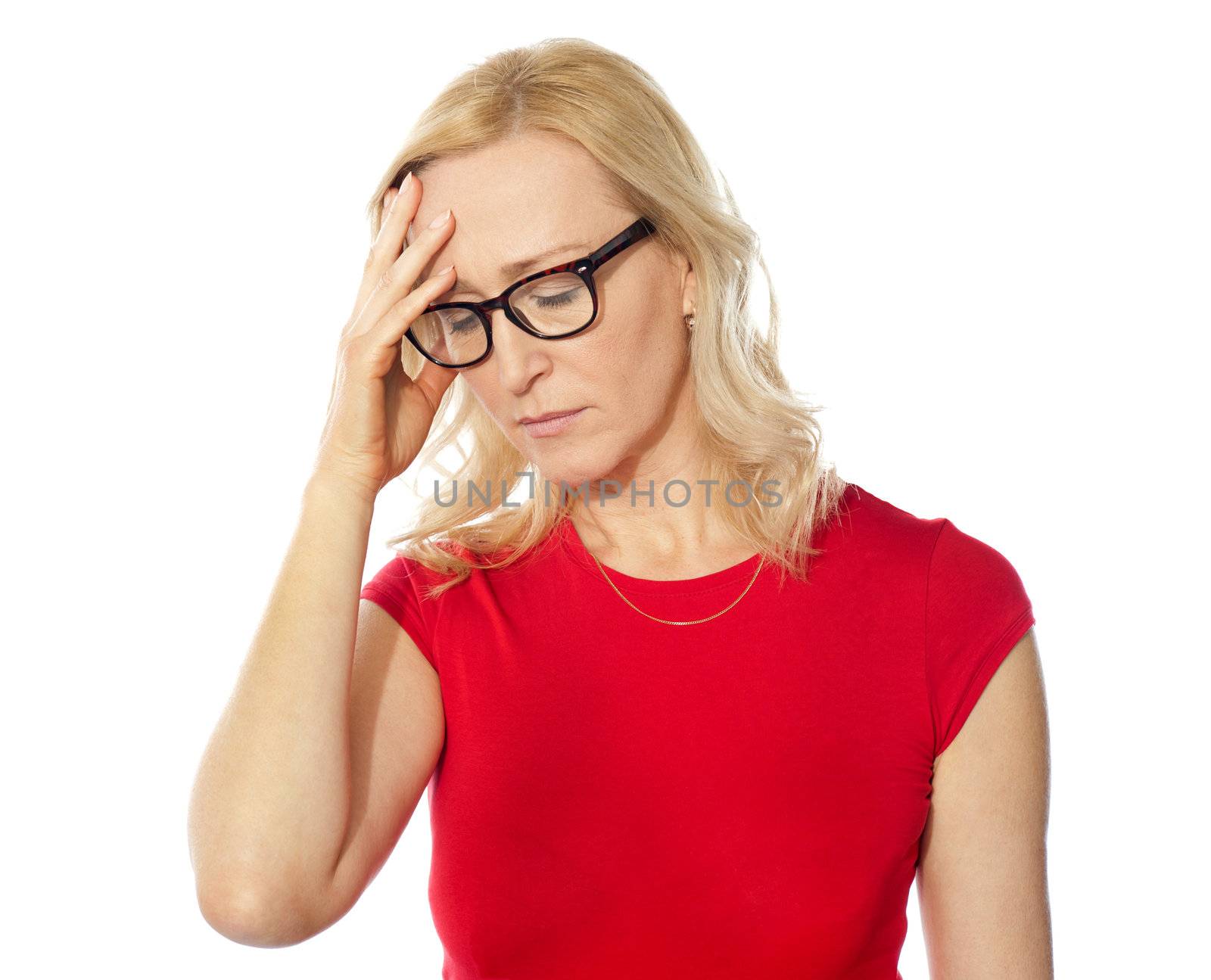 Frustrated pretty caucasian woman with hand on her head