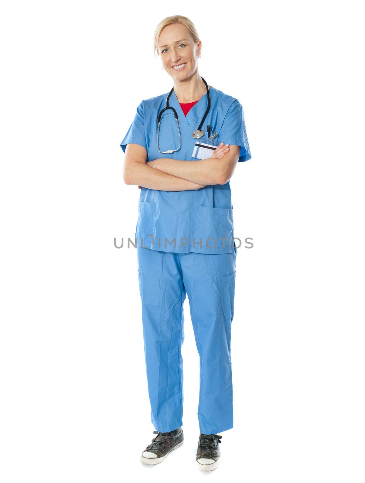 Aged medical professional posing with stethoscope around her neck looking at camera