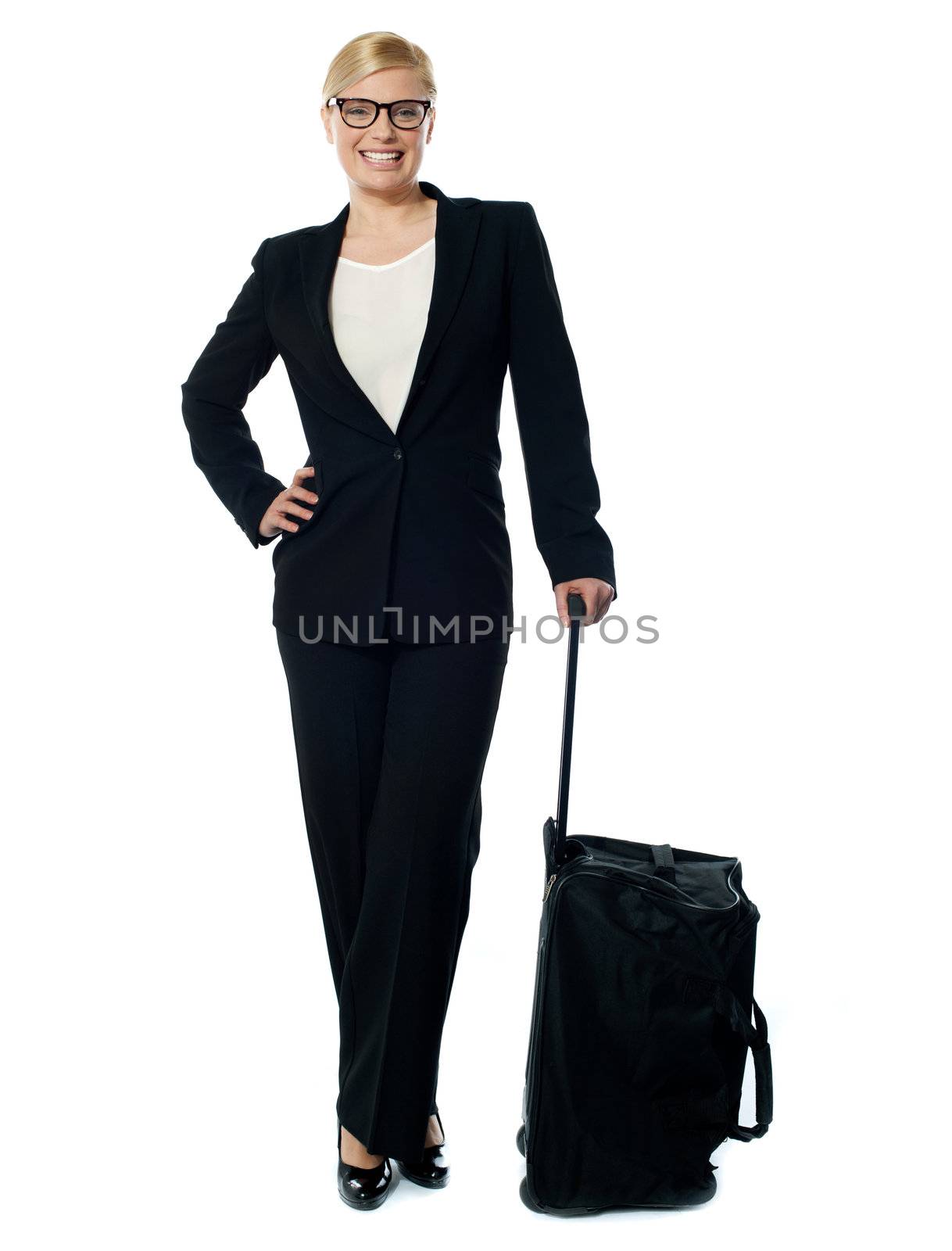 Corporate person carrying trolley bag by stockyimages