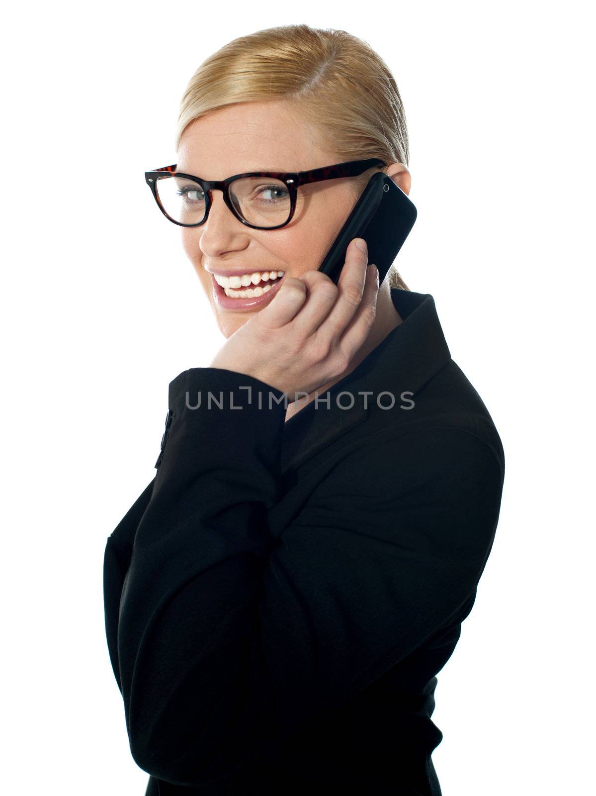 Female manager attending phone call by stockyimages