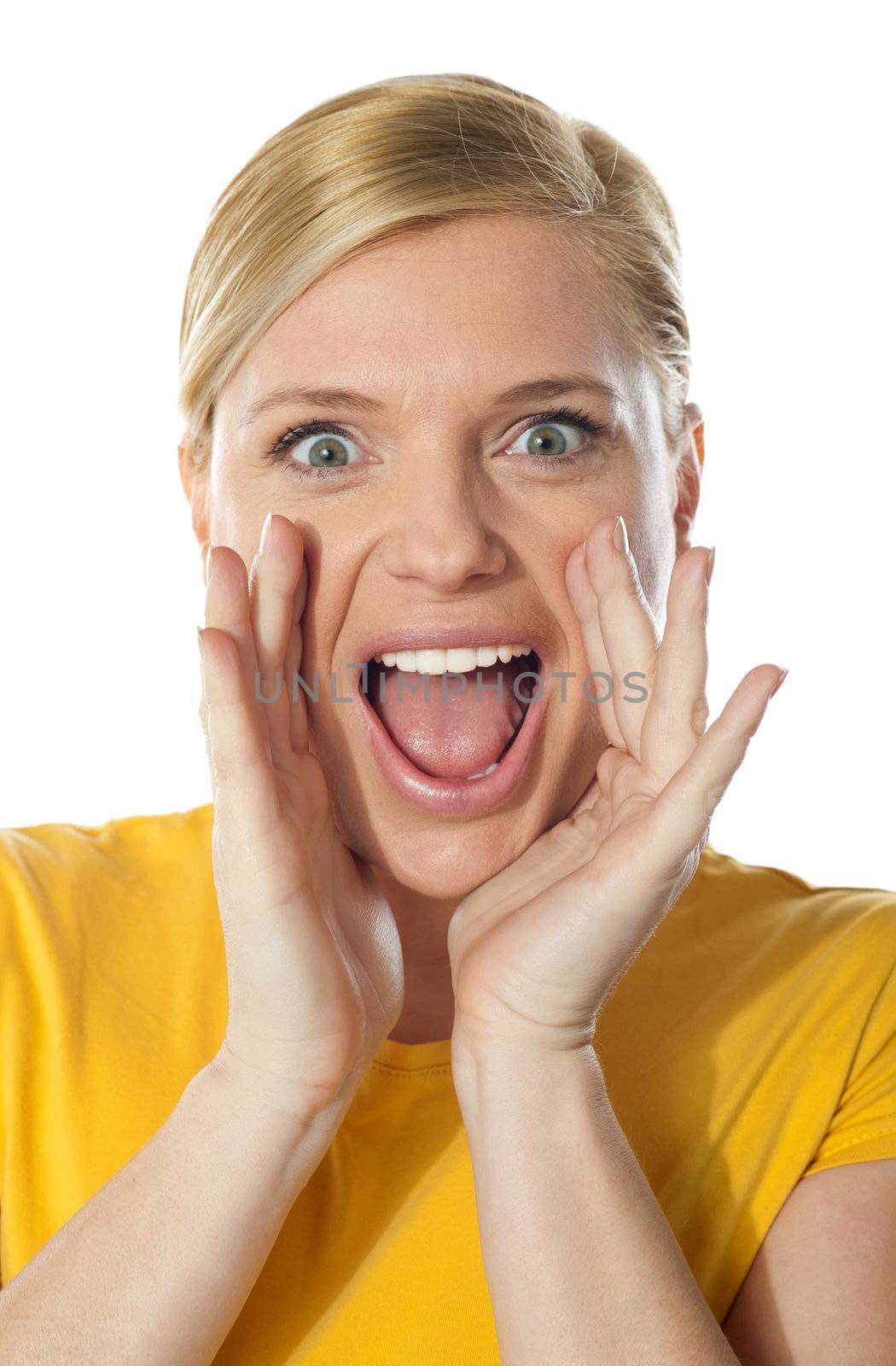 Cute girl shouting in front of camera against white background