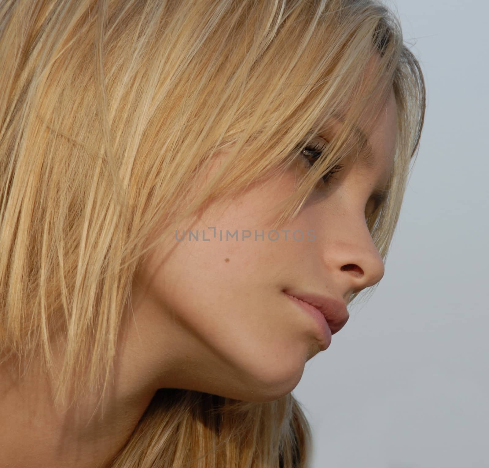 portrait of a beautiful young teenager with bland hair