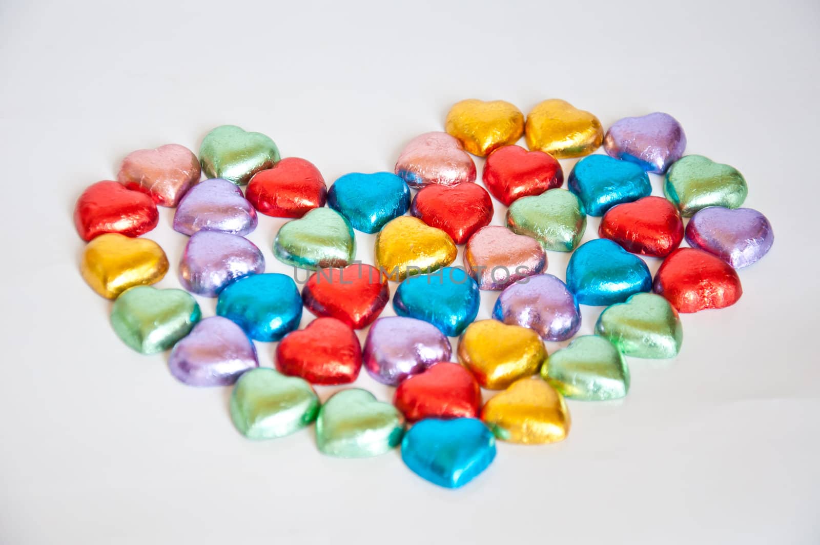 Colorful of chocolate heart shape on white background