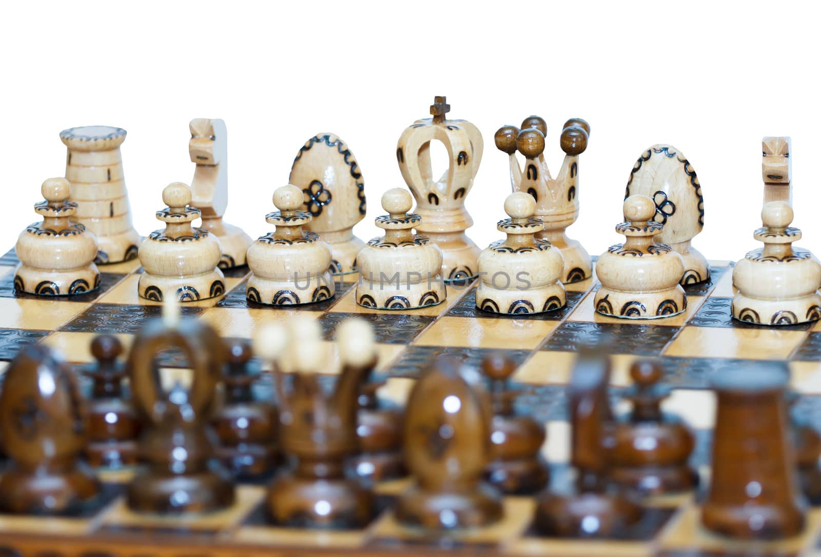 chess board focus to white king and queen on white background