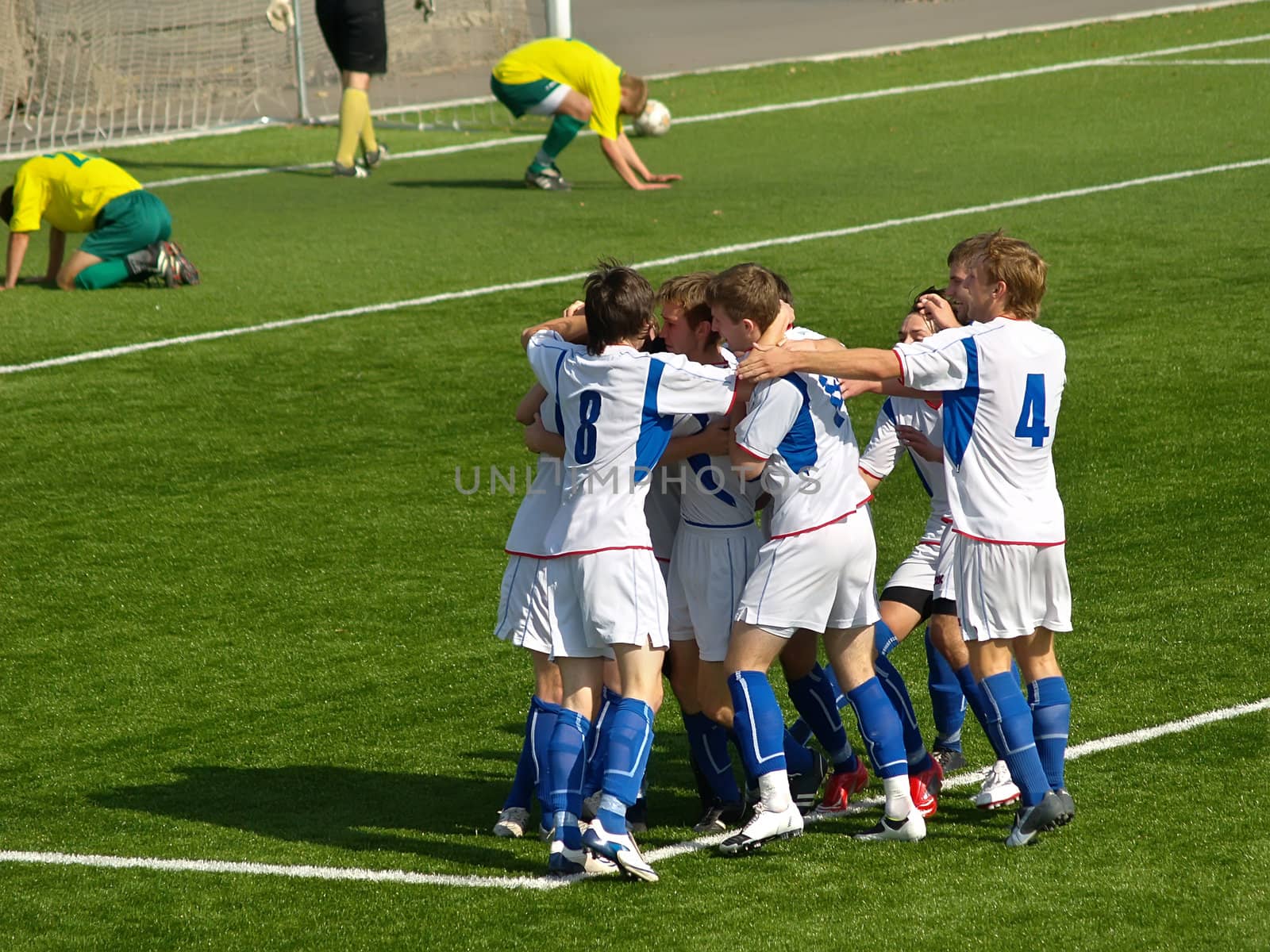Football players celebrating goal by kvinoz