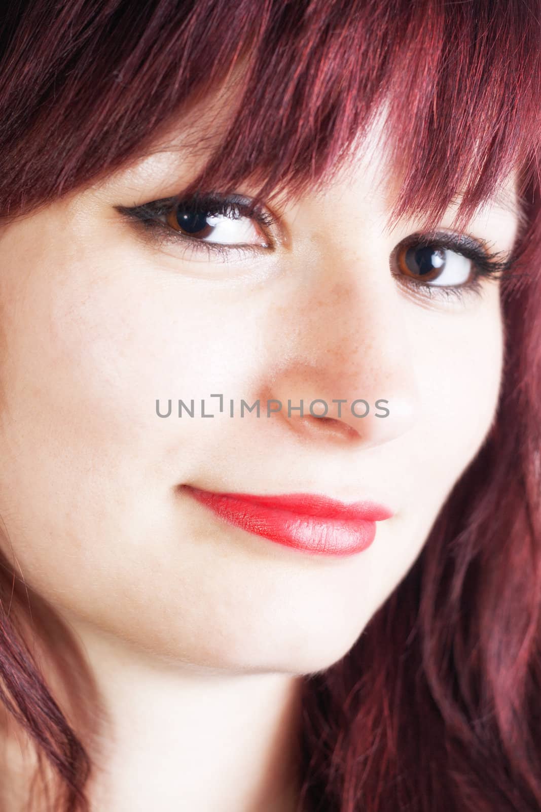 Closeup Portrait of young beautiful woman with red lips - isolated on withe background