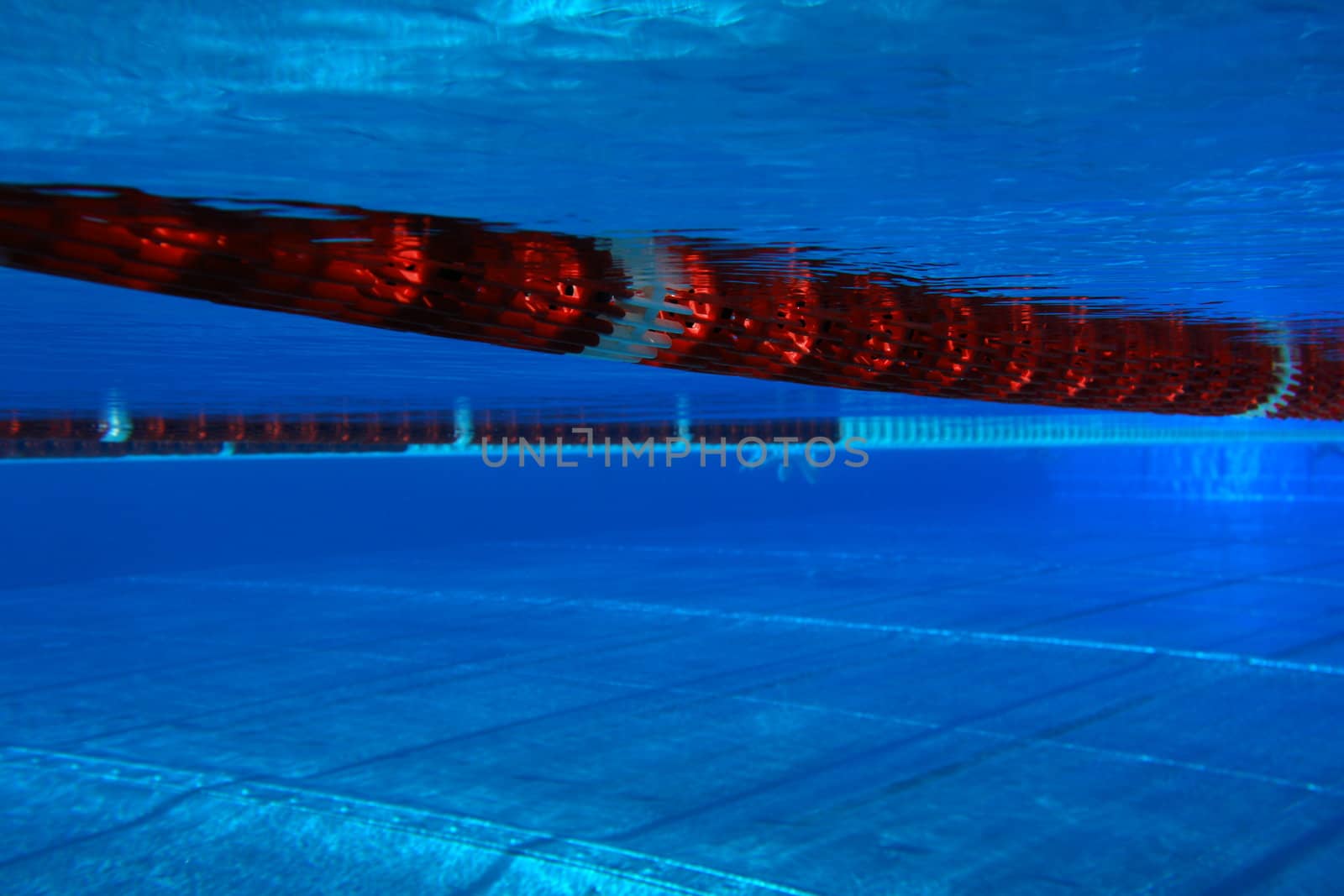 underwater view from a swimming pool with red marking