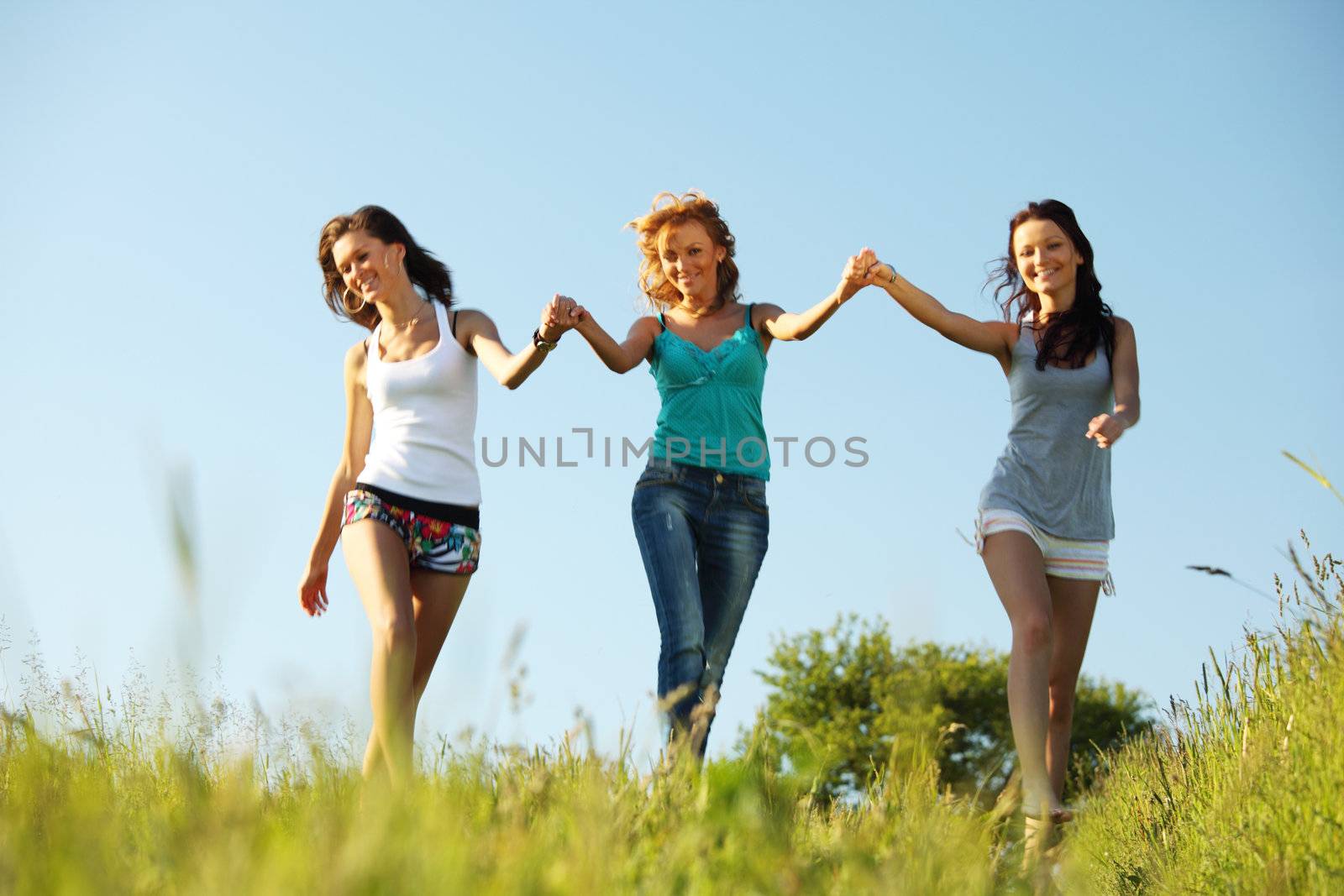 fun smile girlfriends run by green field sun is shine