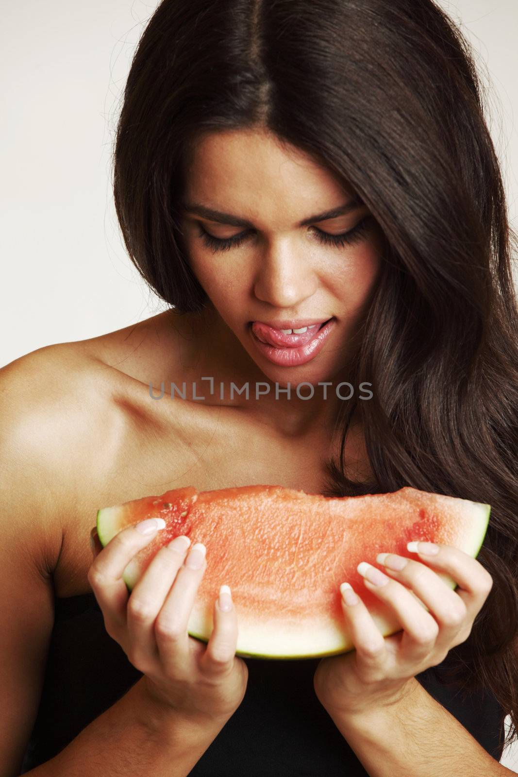  woman hold watermelon in hands isolated on white