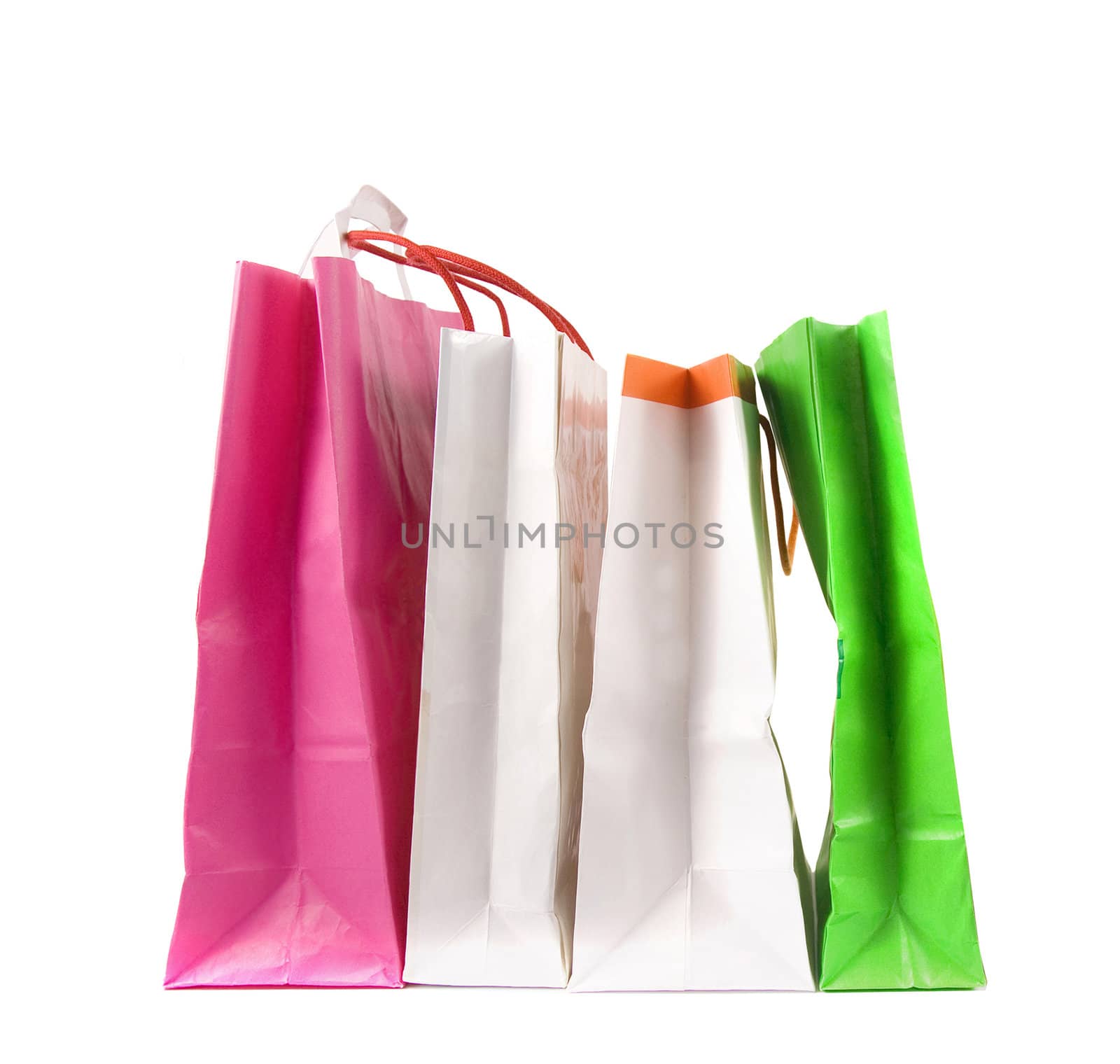 Assorted colored shopping bags on a white background