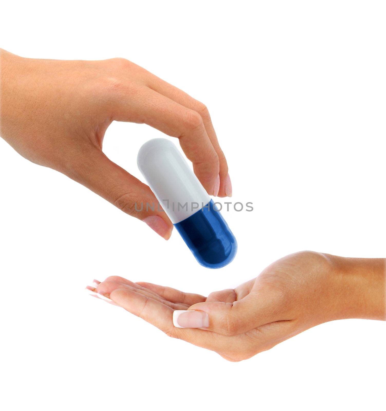 hand gives a big pill