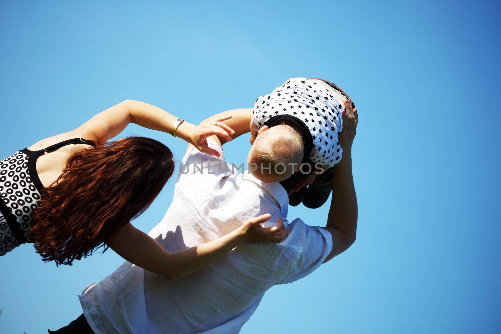 happy family blue sky on background