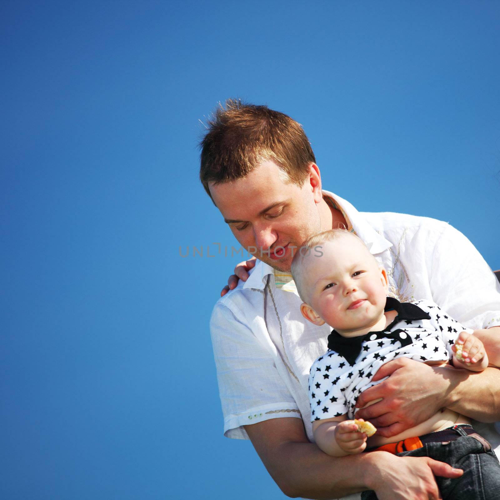 happy family blue sky on background