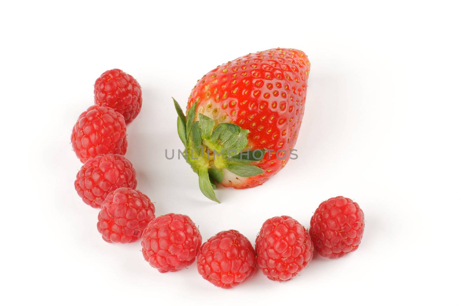 Arrangement of Strawberry and raspberries isolated on white background