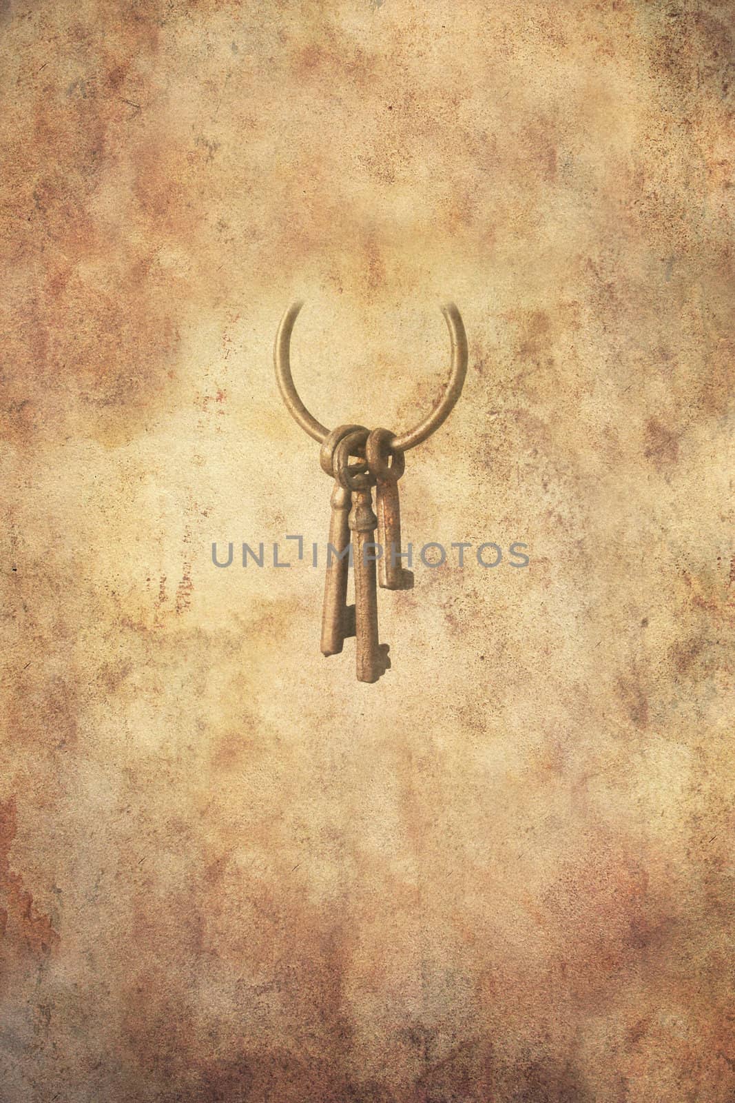 Set of three rusty keys in an open ring hanging freely, in grunge style.