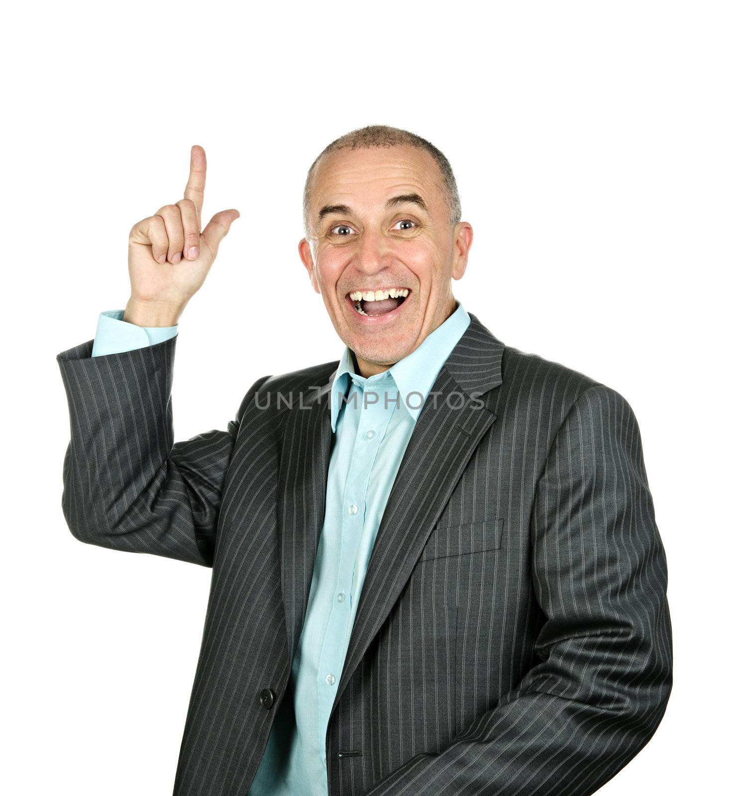 Portrait of smiling pointing businessman isolated on white background