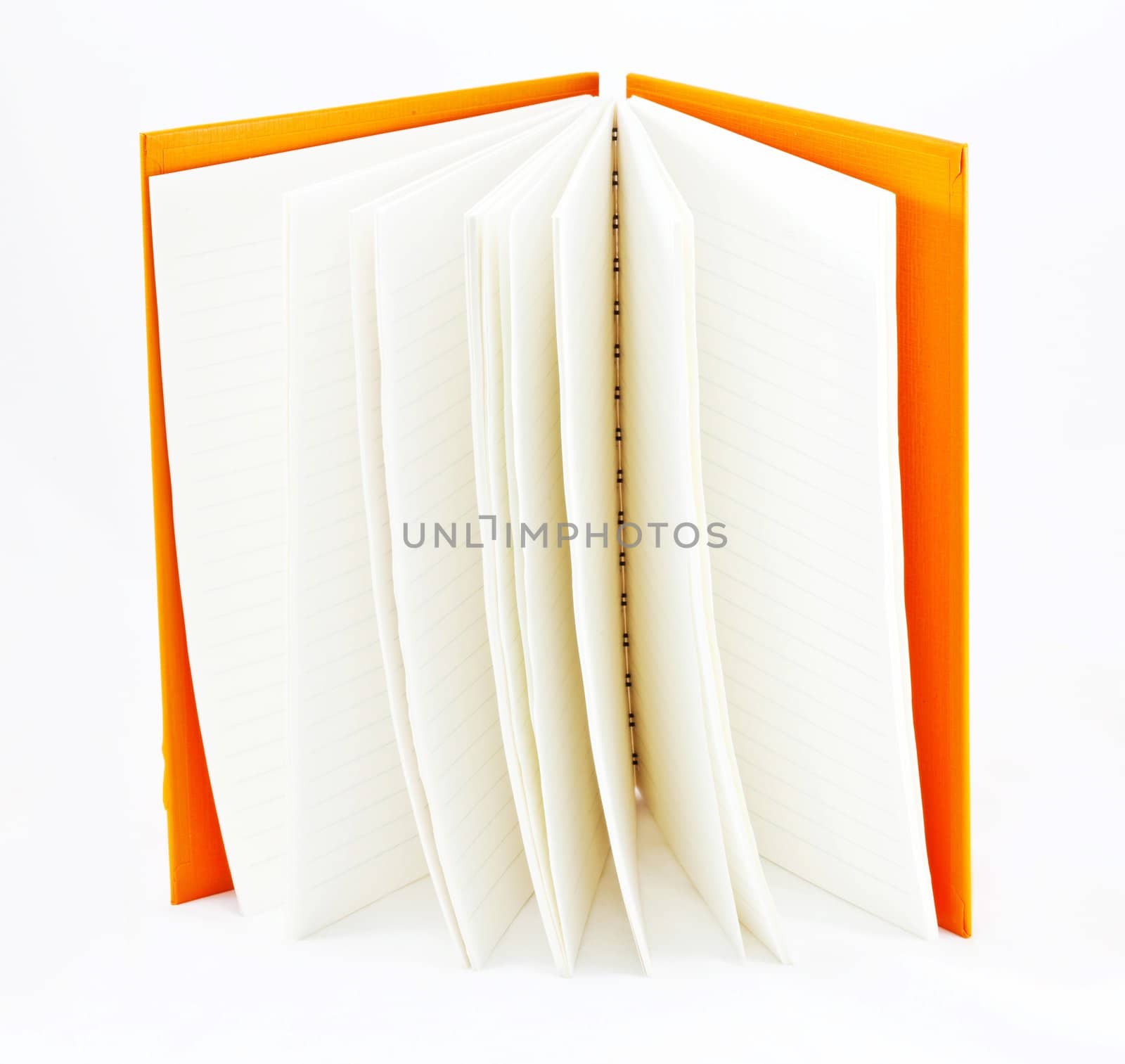 orange notebook on white background